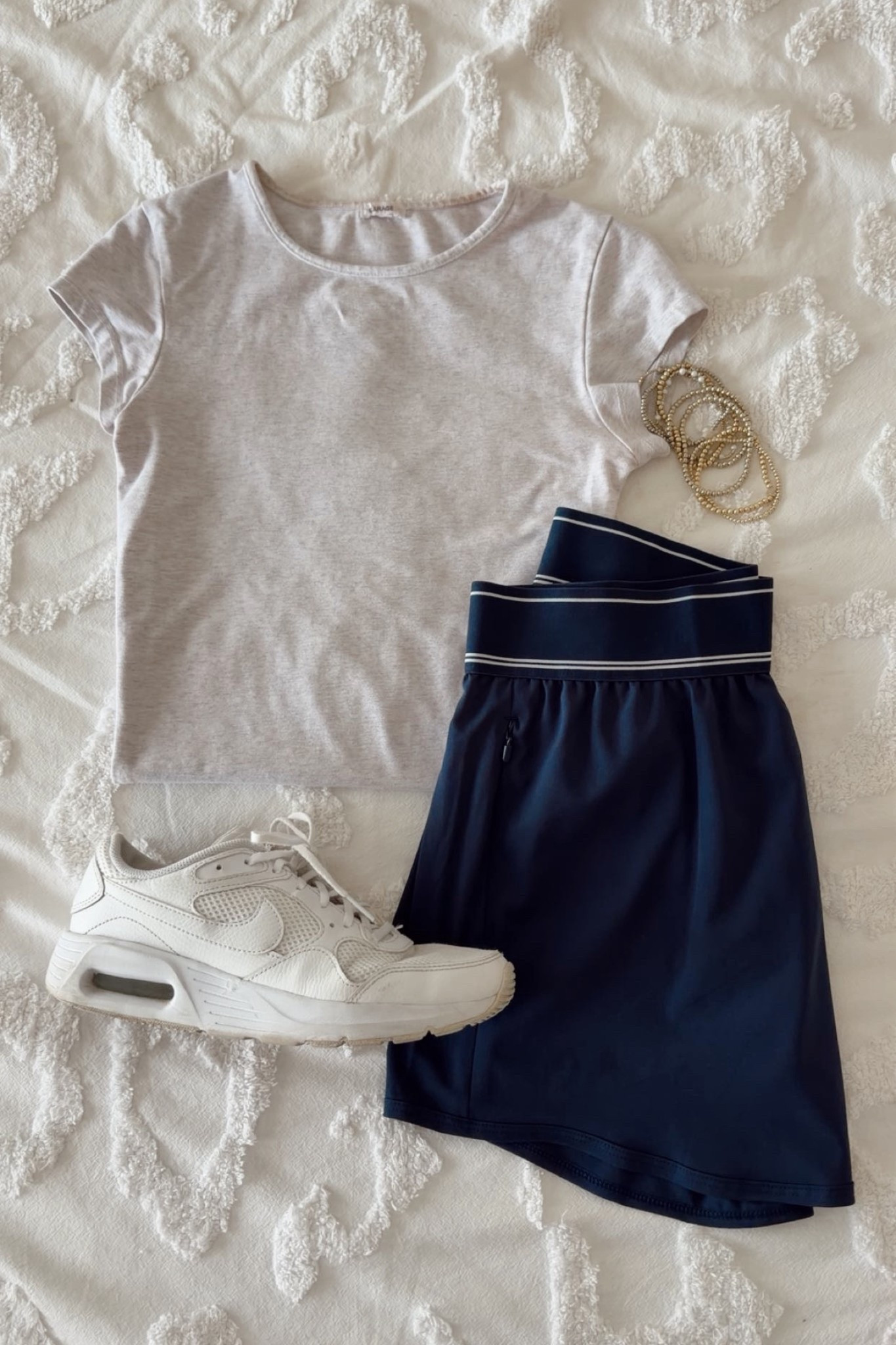 still obsessed with this walmart skirt!! easy to throw on and style in so many ways!! it’s cute, comfy, and the perfect athletic material for anything!! spending time outside, running errands, or chilling around the house, this skirt is a top pick! i have an xs and love the navy & black, but comes in a few others! i love to pair it with a top from garage and my fav tennis shoes!!

#ltkspring #outfitinspo #ltkwalmart #walmartfind #springoutfit #ltkactive

#LTKfitnessgoals #LTKdayinmylife #LTKActive