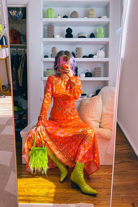 Fall transitional outfit 🍂🌸

Champagne wears a multicolored orange red and yellow gold maxi dress from Never Fully Dressed, green leather boots and neon like green feather rhinestone purse bag.

Dopamine dressing colorful vibrant eclectic maximalist maximalism rainbow multicolored colored hair style fashion inspo color fall Halloween witch costume #LTKHalloween

#LTKHoliday #LTKSeasonal