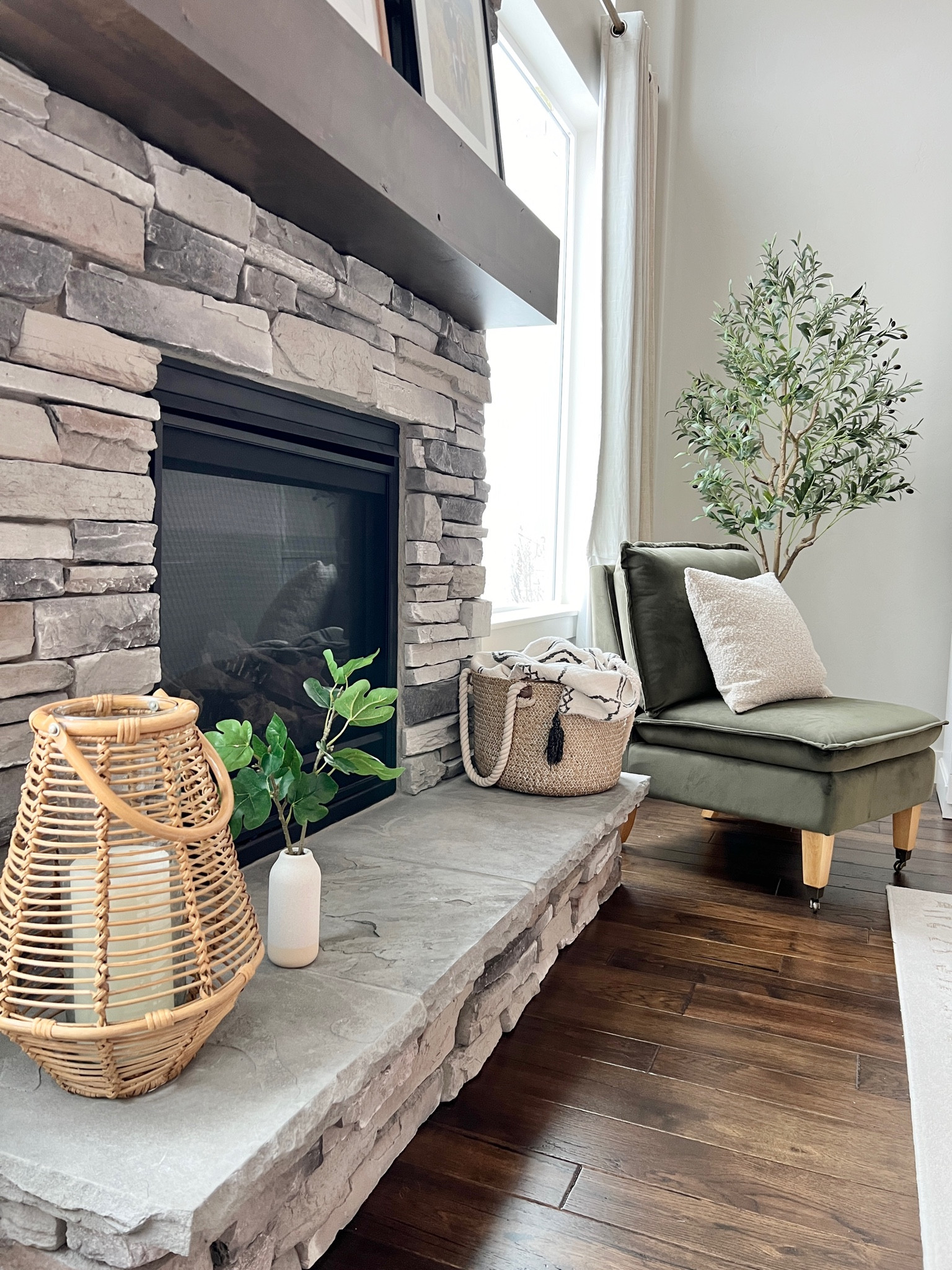 Shop my fireplace hearth and corner living room! 

Target decor | faux plant | throw blanket | olive green chair | textured pillow 

#LTKfindsunder50 #LTKfindsunder100 #LTKhome