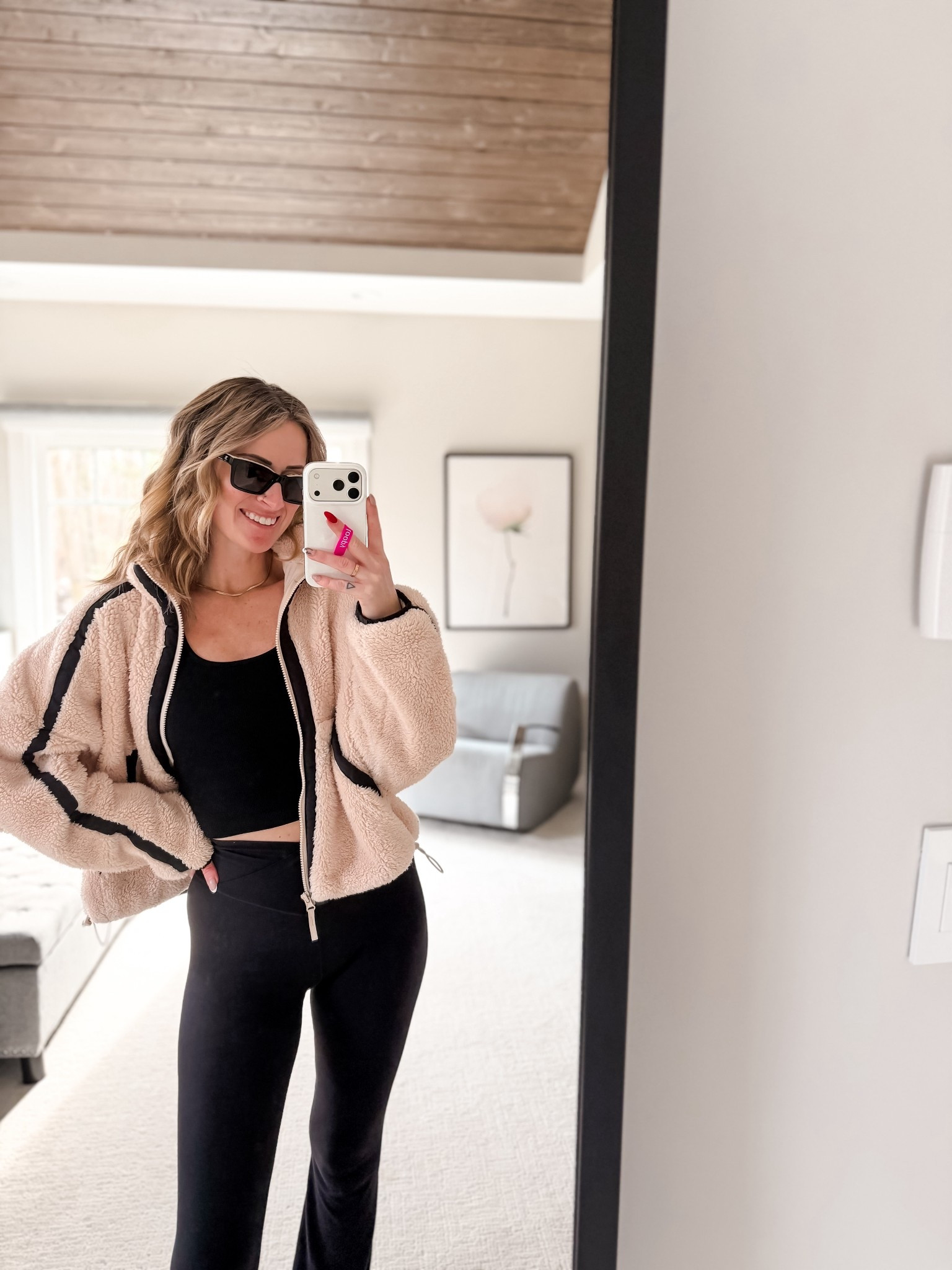Soccer mom style and outfit ideas
Chanel sunglasses and target Sherpa zip up with black flare leggings 
