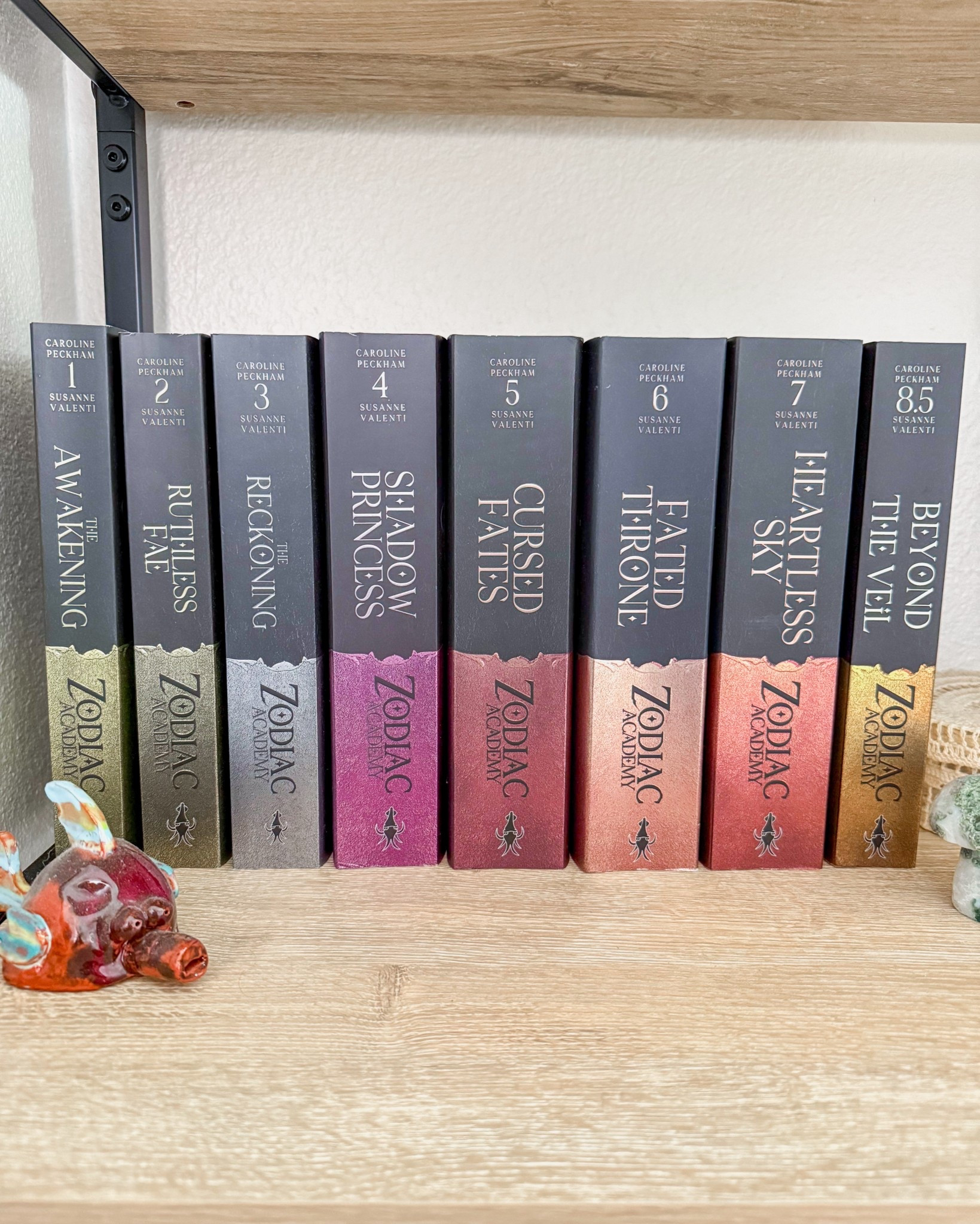 The Zodiac Academy Series by Caroline Peckham and Susanne Valentini
The Awakening
Ruthless Fae
The Reckoning
Shadow Princess
Cursed Fates
Fated Throne
Heartless Sky
Sorrow and Starlight
Beyond the Veil
