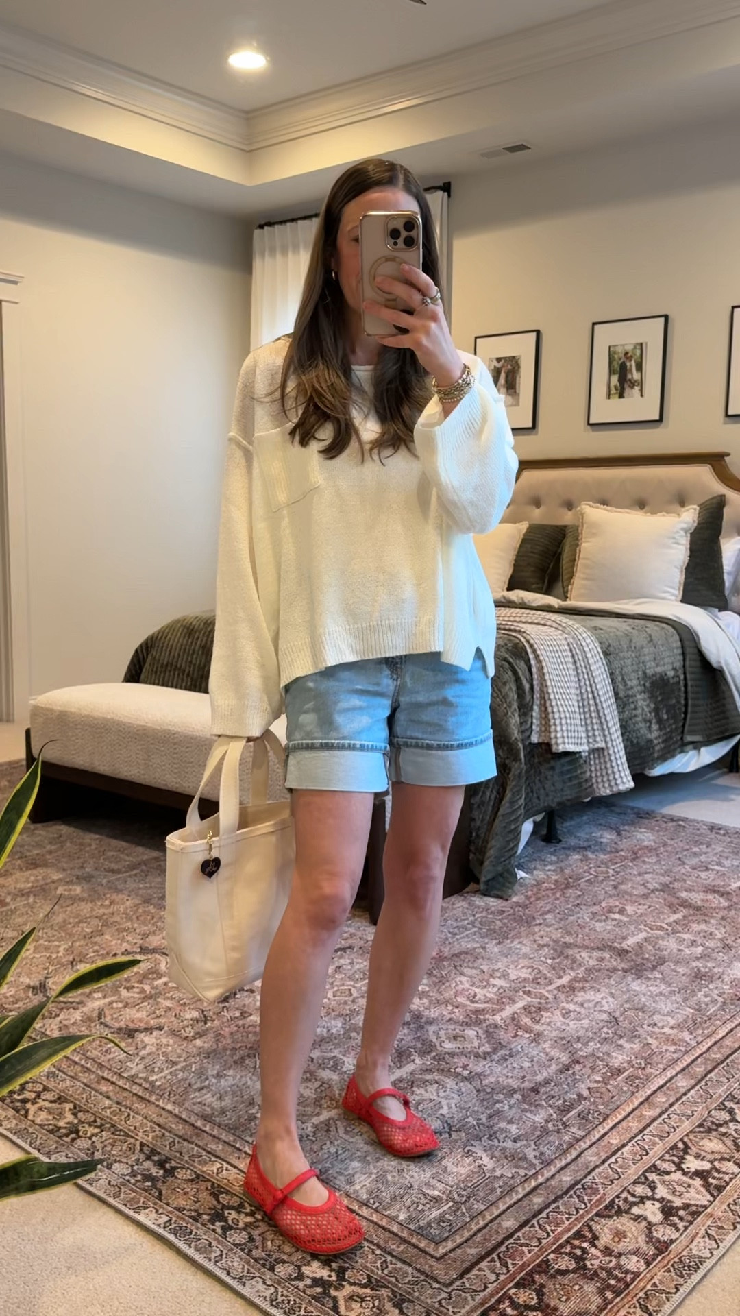 Casual Spring Mom Outfit ❤️

• Lightweight neutral sweater
• Cuffed denim shorts
• Red Mary Jane flats
• Neutral canvas tote

This is my favorite kind of transitional outfit — cozy on top, easy on the bottom, and a bold shoe to make it feel styled.

The oversized knit keeps it relaxed and comfortable, the cuffed denim shorts balance the proportions, and the red flats instantly elevate the entire look.

Perfect for:
• Casual mom outfits
• Spring shorts outfit
• Denim shorts styling
• Red flats outfit ideas
• School drop-off outfit
• Elevated everyday basics
• Capsule wardrobe summer

This is one of those simple outfit formulas you can repeat all season: neutral base + classic denim + one statement accessory.



#LTKgrwm #LTKmomlife #LTKootd