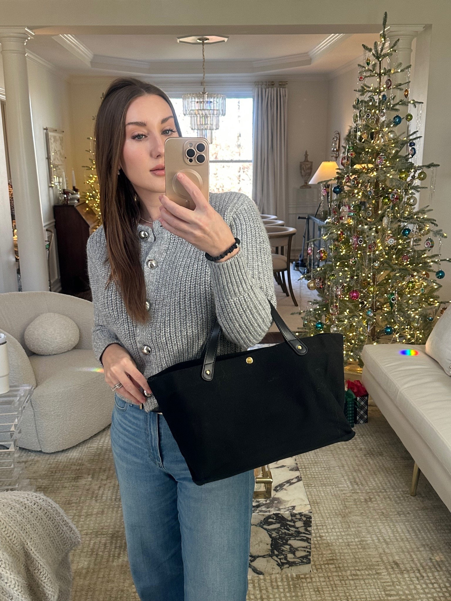 The perfect everyday tote bag. So chic and classic. Beautiful leather handles and pretty gold button details. Holds so much- also comes in a mini version 


#LTKootd #LTKFindsUnder100