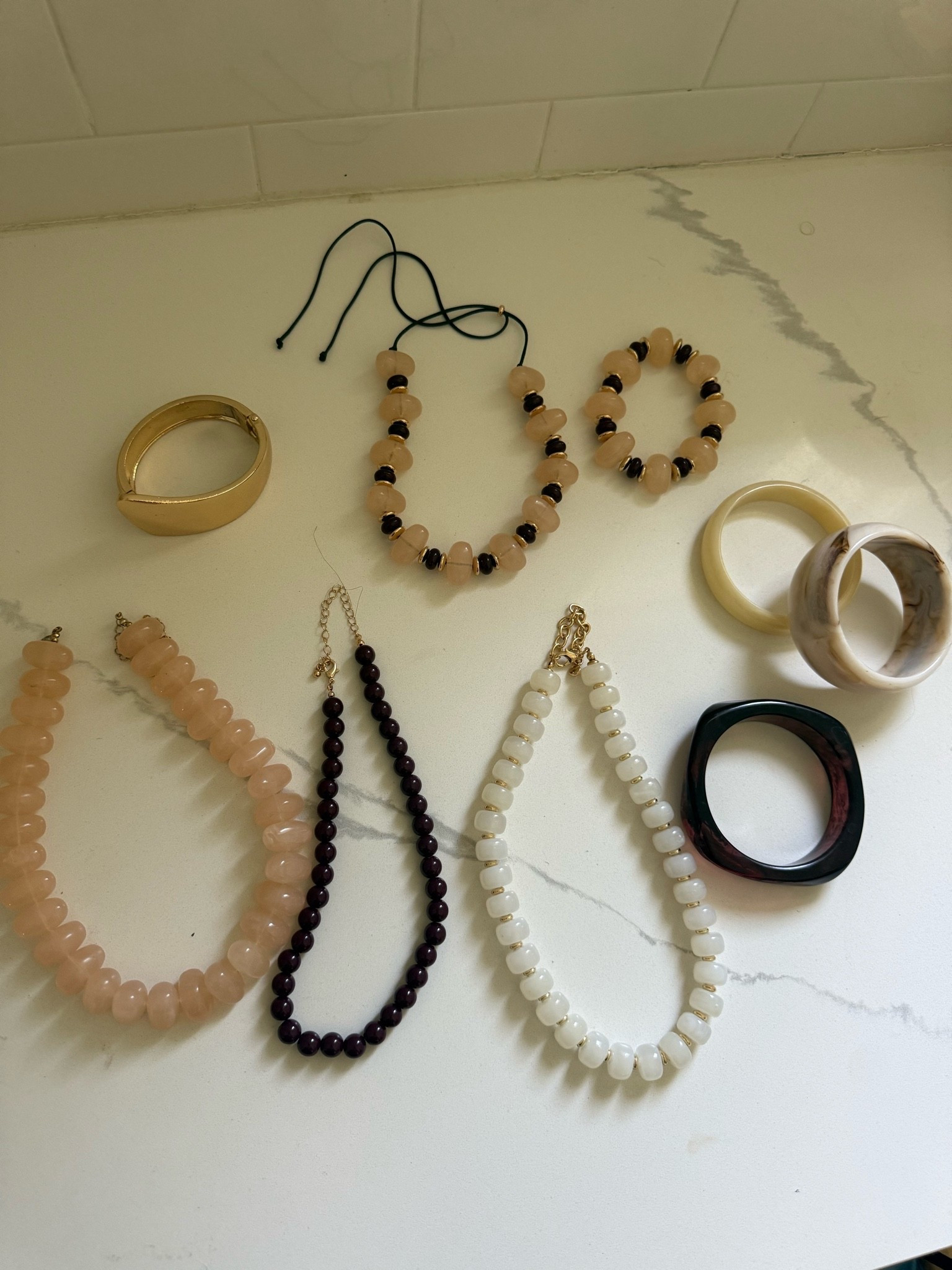 Chunky bracelets and necklaces