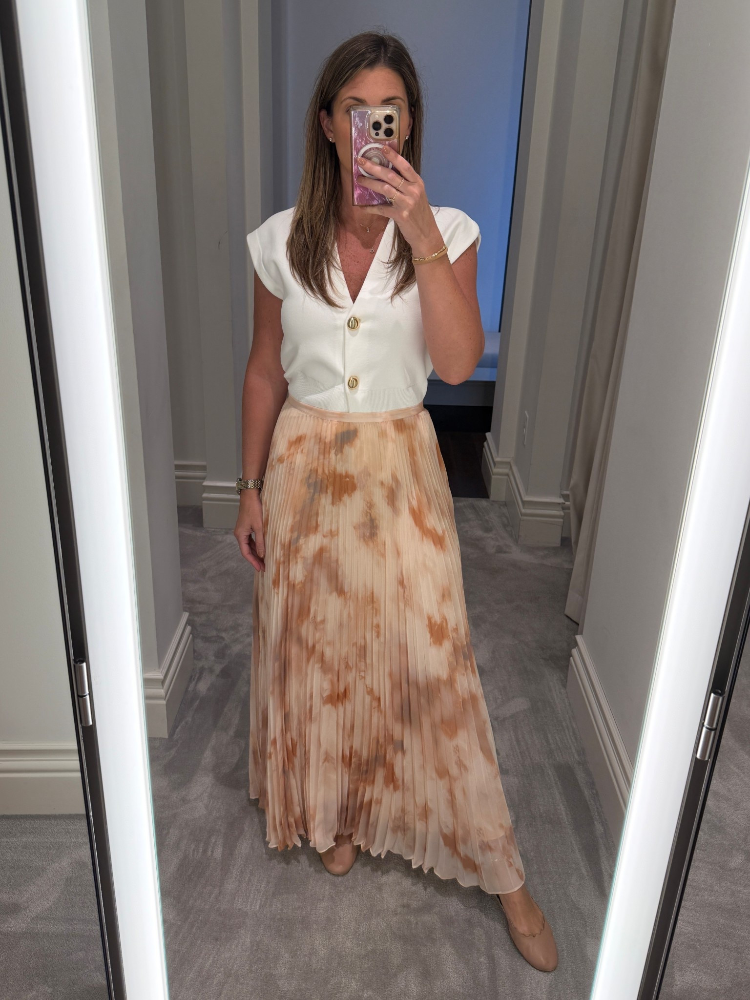 Neutral doesn’t have to be boring, Loving this color palette. A pleated maxi skirt makes for a great day to night piece.

Skirt runs TTS. Wearing a 6.
Knit runs TTS. Wearing a small. 

#LTKootd #LTKOver40 #LTKTall