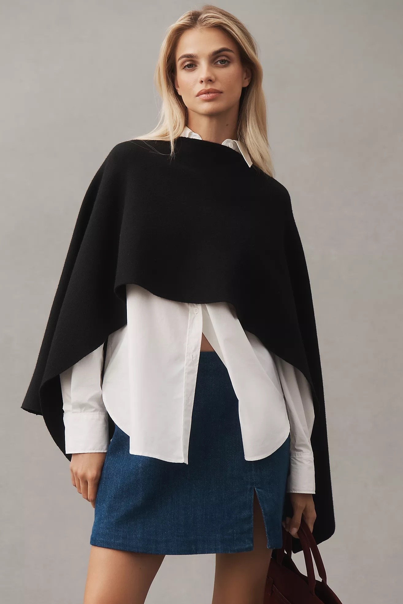 Nothing says Parisian style like a layered black knit poncho over a crisp white shirt. Tres chic!

#LTKSeasonal #LTKHoliday #LTKGiftGuide
