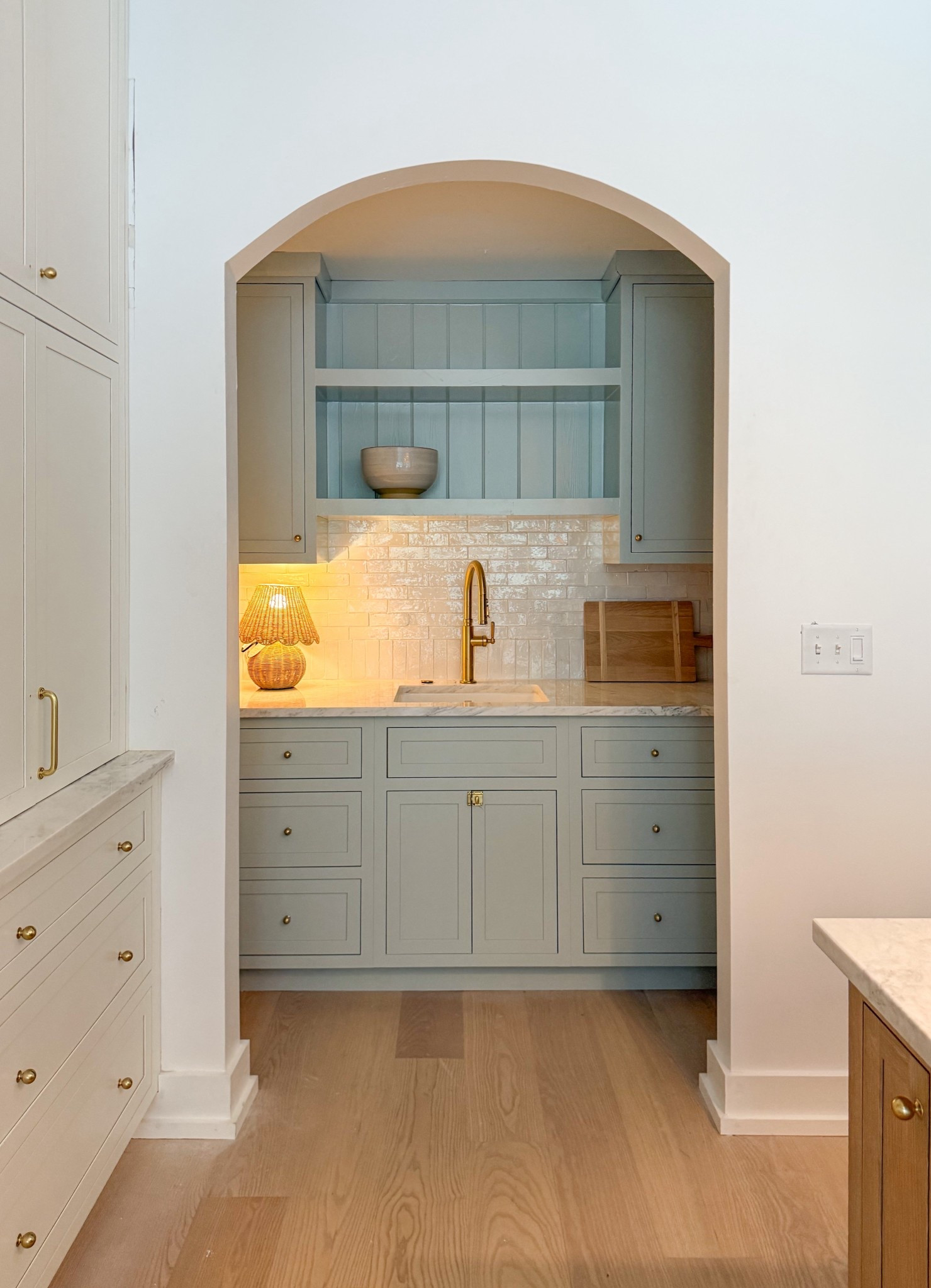 Cabinets are BM Quiet Moments. Tops Scorpious White Dolomite. Floors Anderson Tuftex European Ash Parfait. Grout color Mapie Avalanche. Knobs Aged brass finish 7/8”  linked below  

#LTKHome