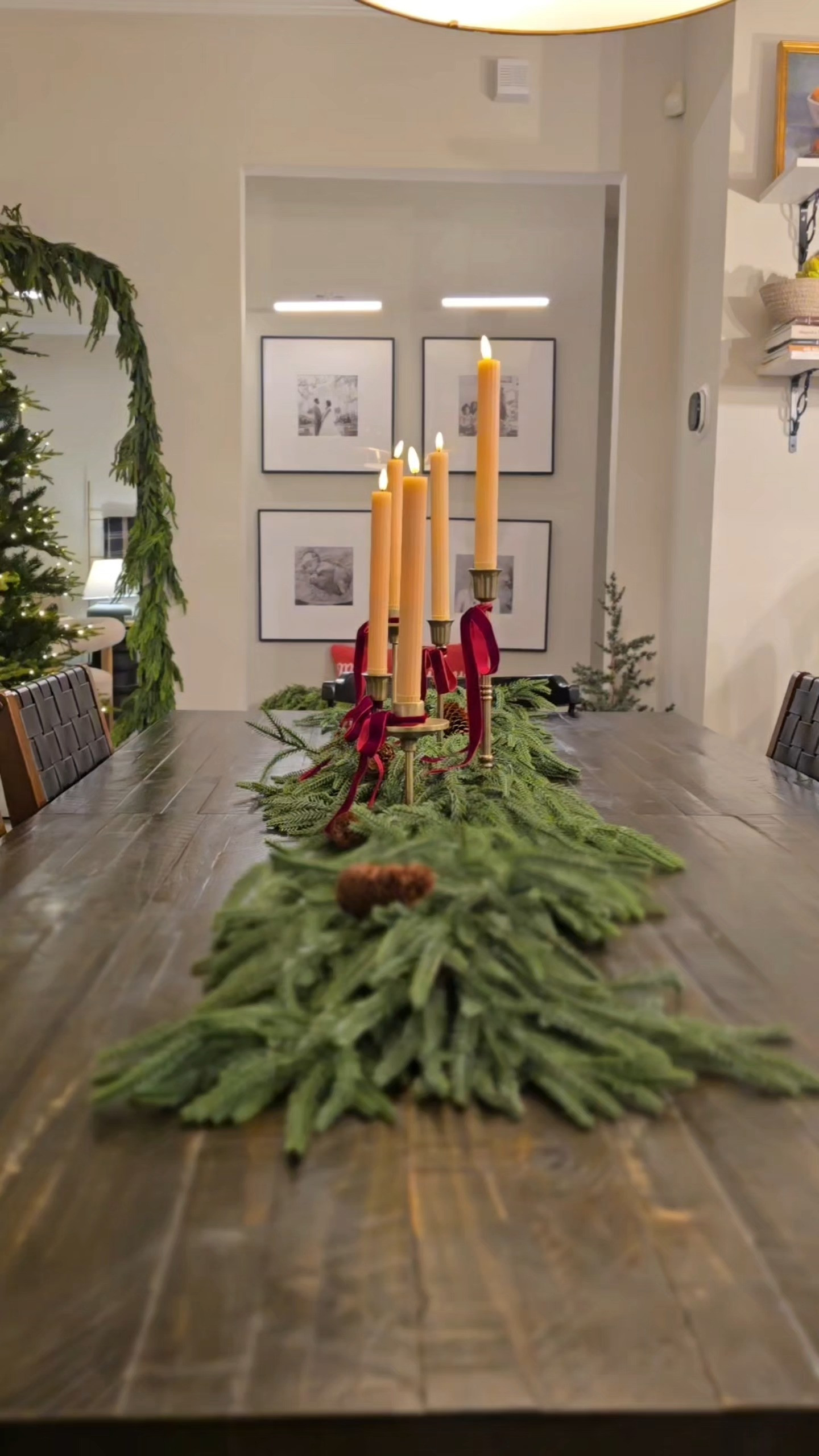 Christmas Centerpiece using 6 ft Norfolk Pine and 5 Taper Candle holder, battery operated taper candles 

 #LTKHoliday #LTKSeasonal #LTKHome
