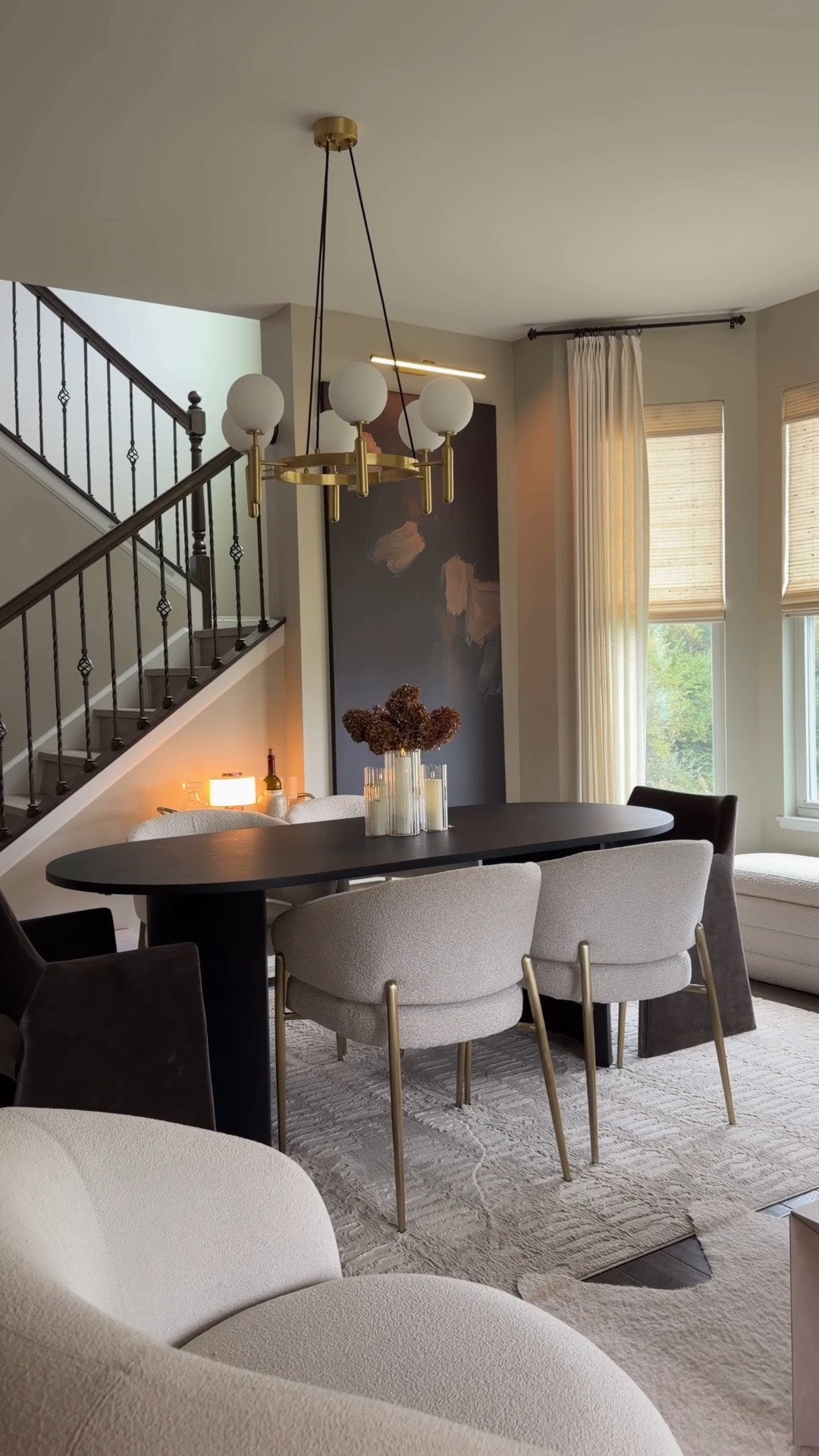 A dining room that finally feels collected. The oversized moody art, warm brass details, soft textures and that little glow from the picture light completely changed this corner. I love how a few intentional pieces can make a space feel so much more elevated without changing everything. This one might be staying exactly like this for a while. 🤎

art size 36x72
@Wayfair

#LTKHome