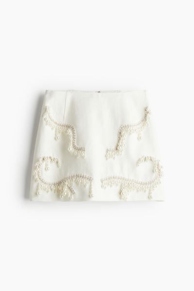 Bead-embellished linen skirt | H&M (DE, AT, CH, NL, FI)