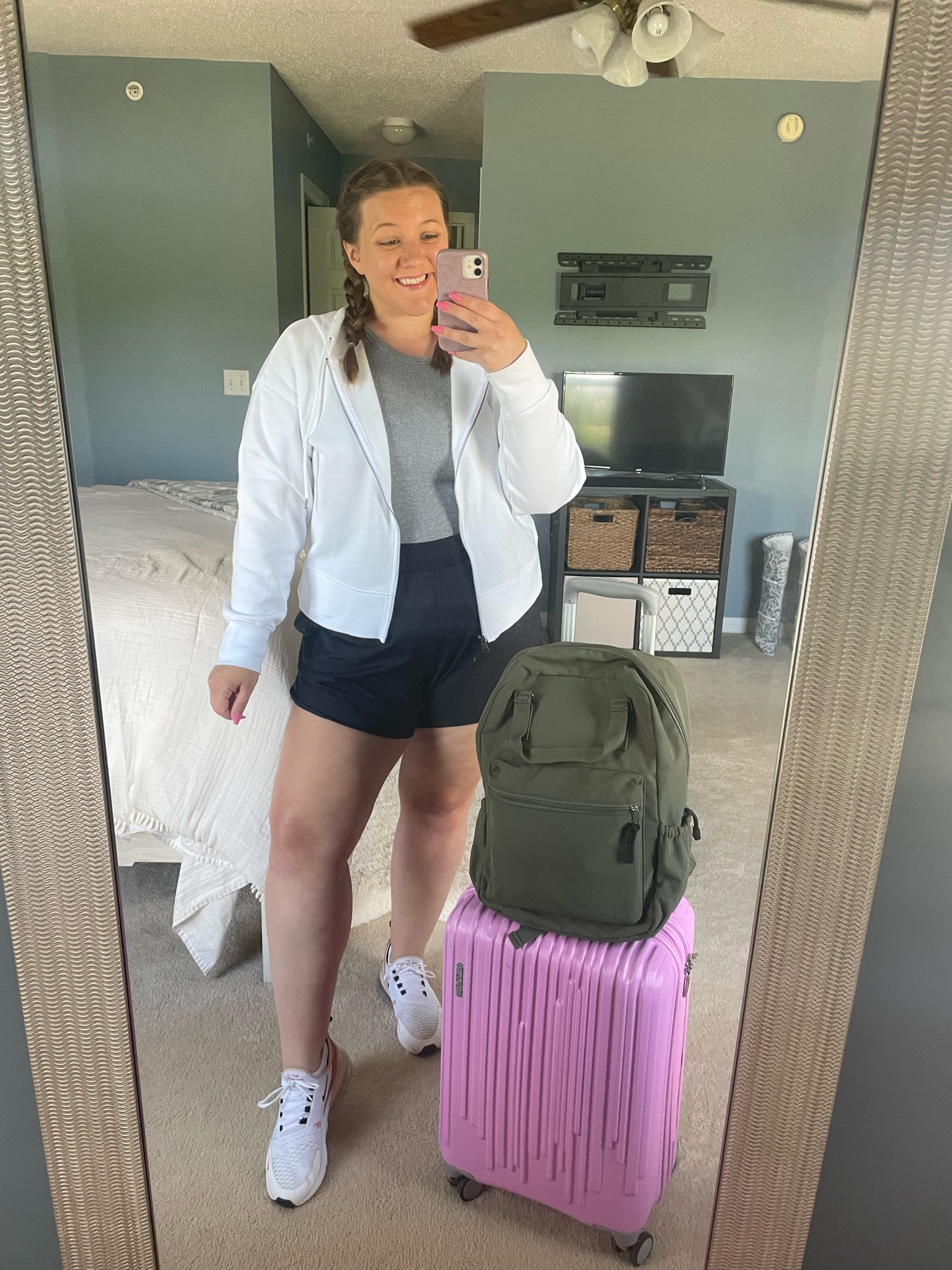 Here’s what I’m wearing for my flight today! ✈️ I aim for comfort and ease while flying. I’ll add all the details below. I did size up in the Nikes as they run a bit small. Everything else is TTS! 

Hoodie // Target // size XXL
Tank // Target // size XL
Shorts // Target // size XXL
Shoes // Nike // size 9.5 
Backpack // Target // green
Carryon // Kohls // bright rose

#LTKMidsize #LTKTravel #LTKFindsUnder50