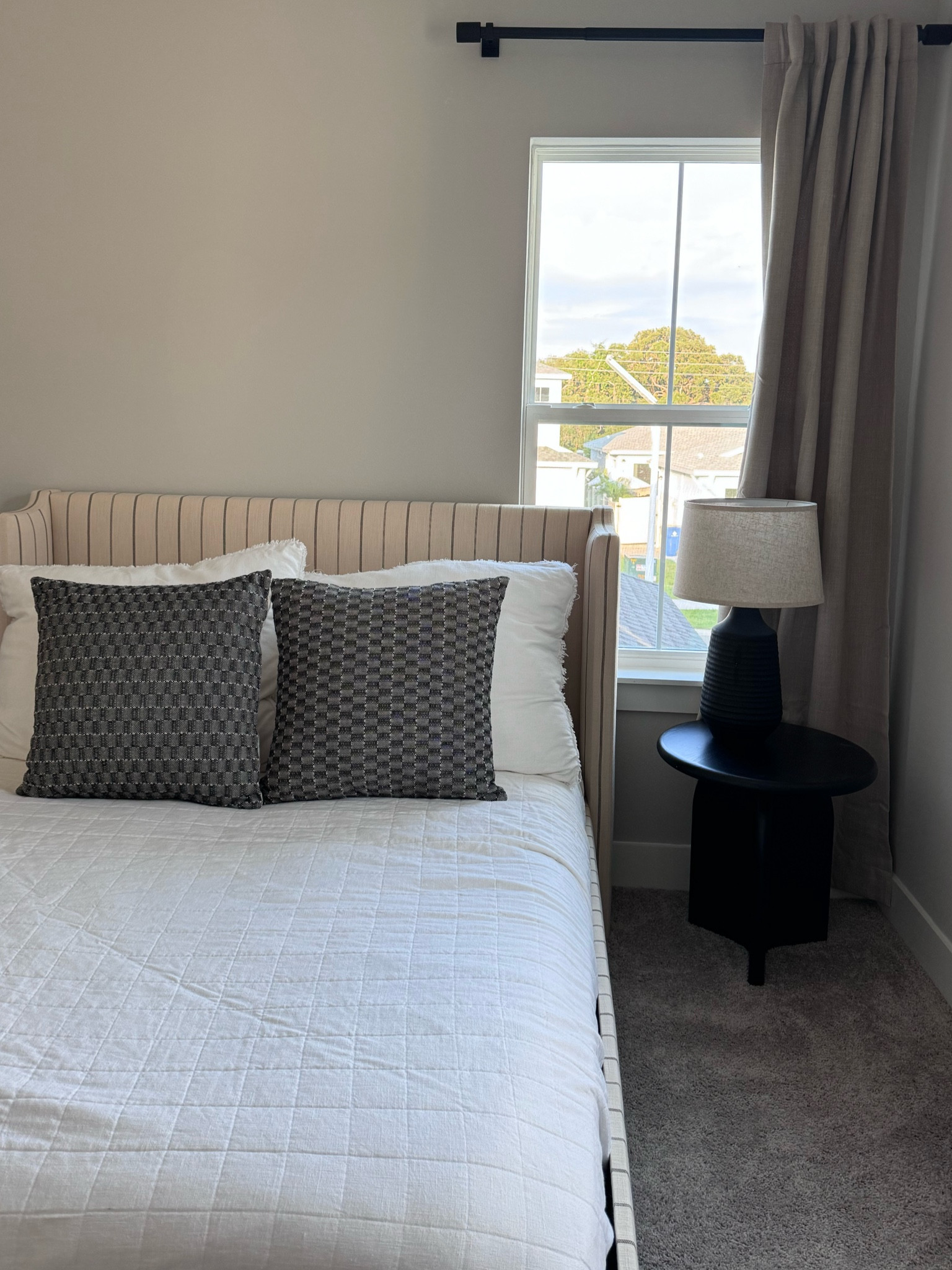 Neutral and welcoming guest bedroom. Lulu & Georgia pieces are incredible high quality. Love the target bedding & hand painted pictures  

#LTKFamily #LTKHome #LTKSeasonal