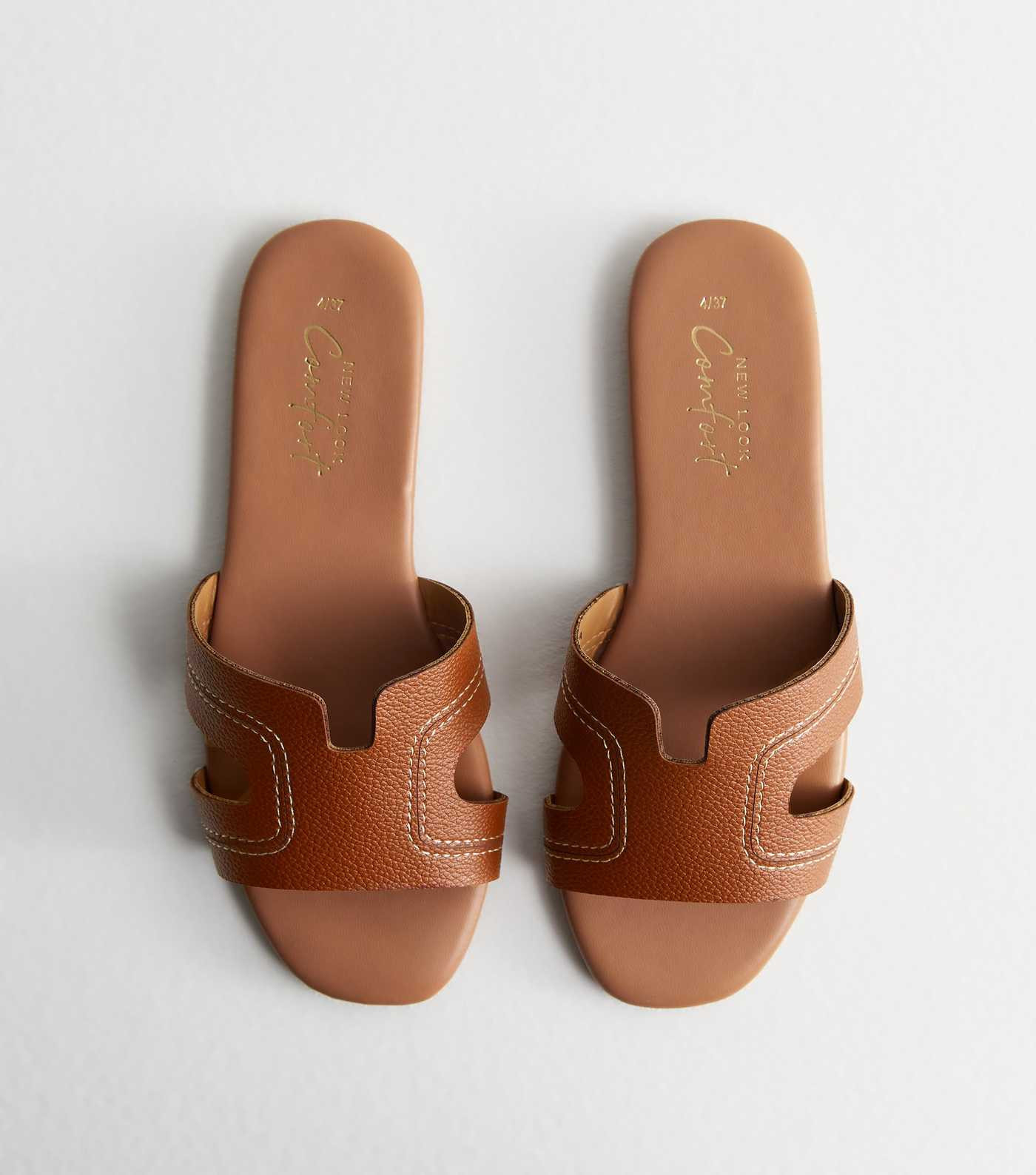 Tan Leather-Look Sliders
						
						Add to Saved Items
						Remove from Saved Items | New Look (UK)