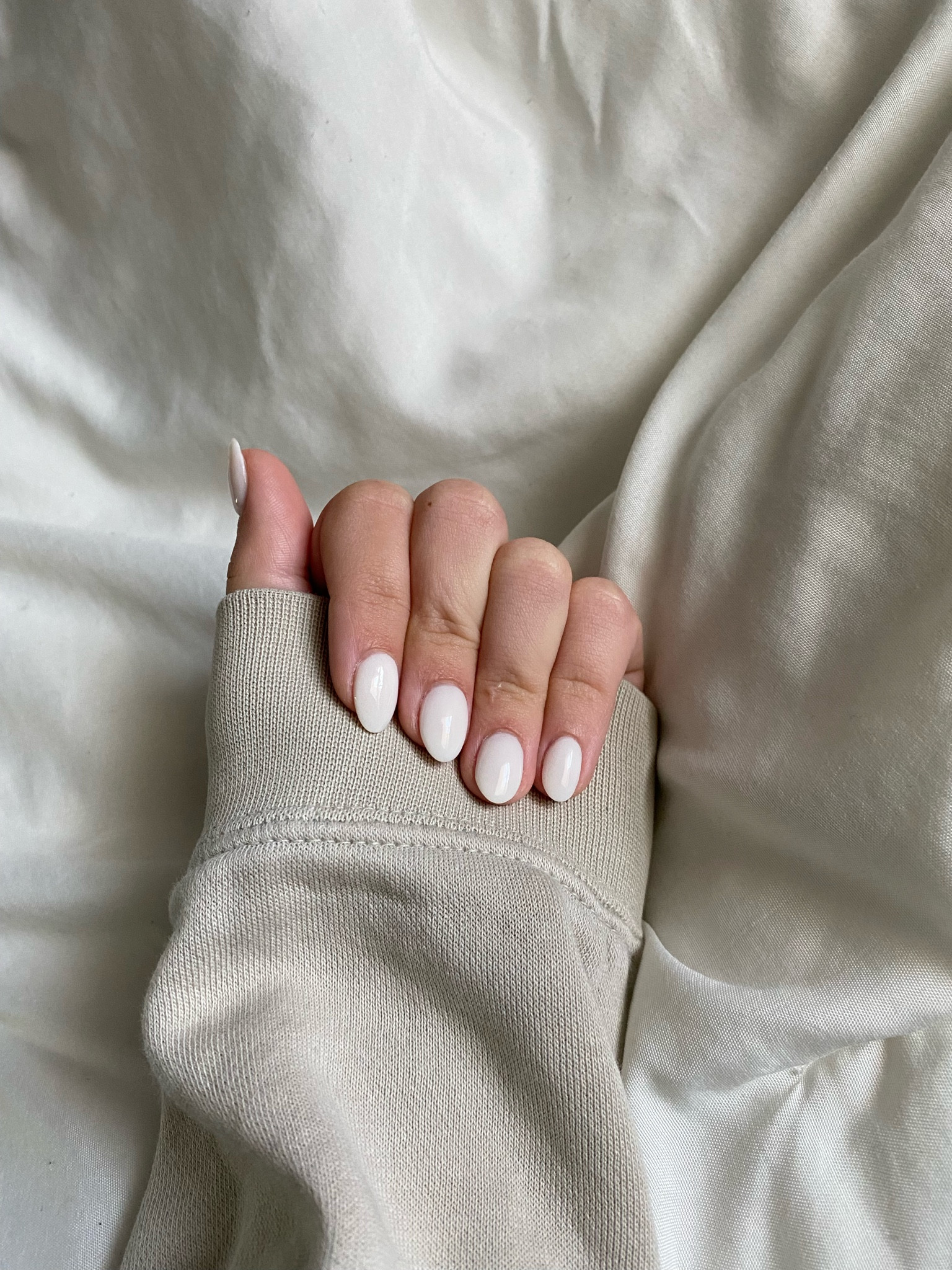 neutral nude almond nails with white designs + trendy funny bunny white hailey beiber dip polish

#LTKitbag #LTKwedding #LTKbeauty