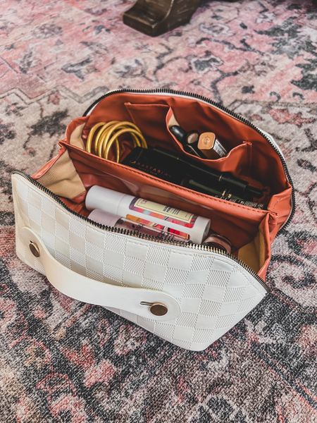 Love this makeup bag!! So big and folds flat 

#LTKunder50 #LTKtravel #LTKitbag