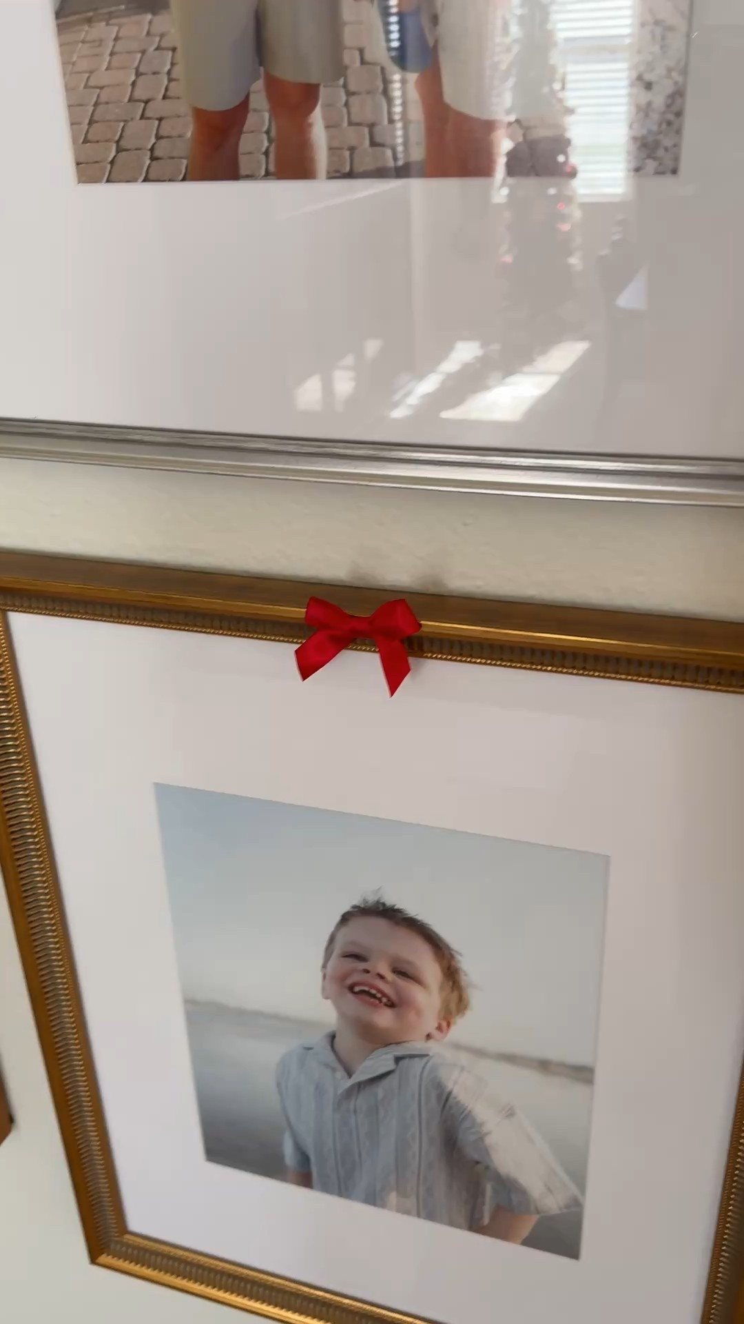 I love sticking these little adhesive bows on all of my pictures for a easy festive touch. 

#LTKHome #LTKHoliday #LTKSeasonal