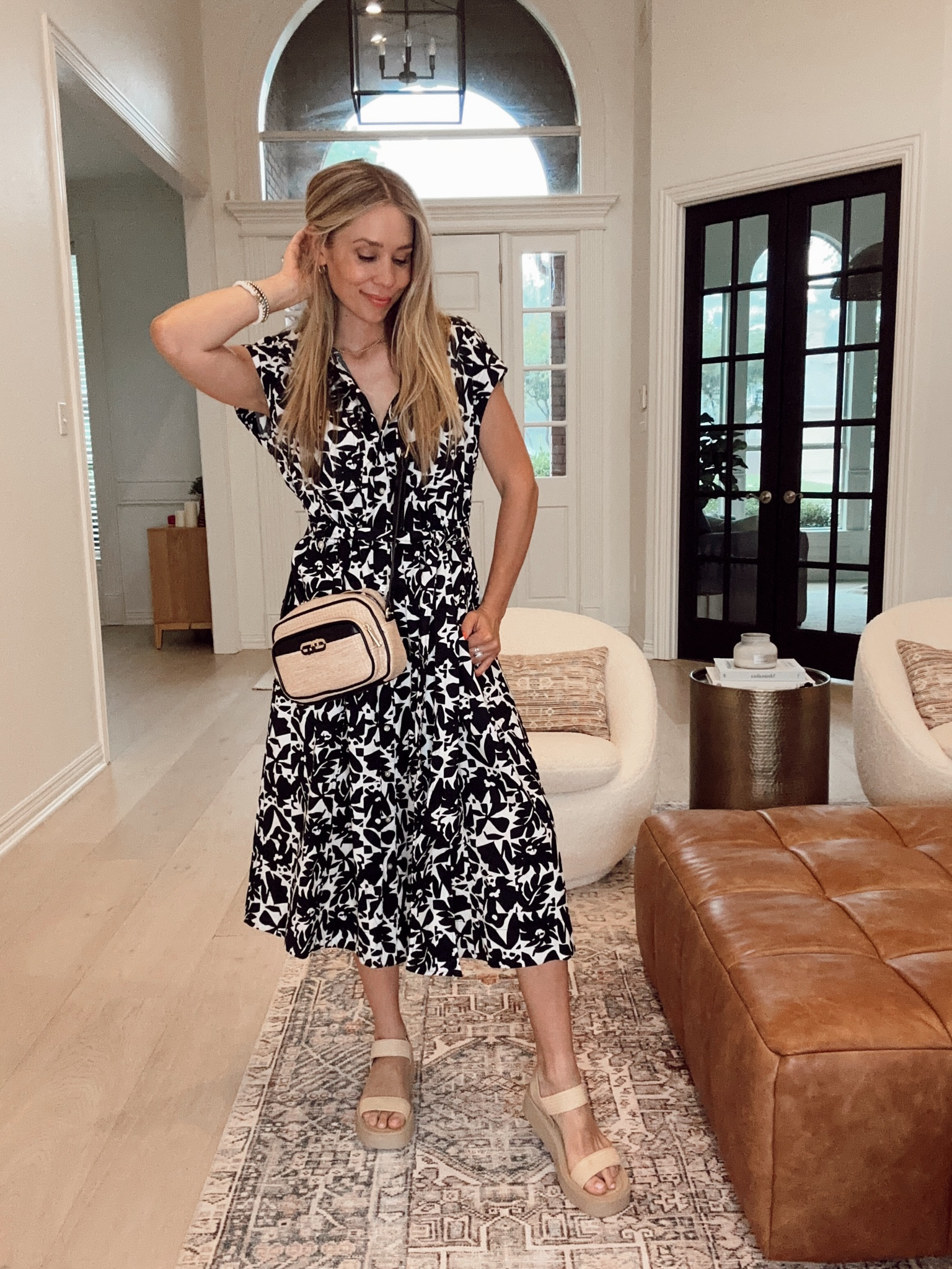 Size small // runs big / size down one (I should have done an xs)

Walmart black and white summer floral dress 