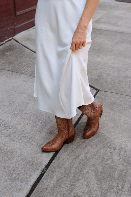 satin skirt and cowboy boots 

#LTKSeasonal #LTKshoecrush #LTKstyletip