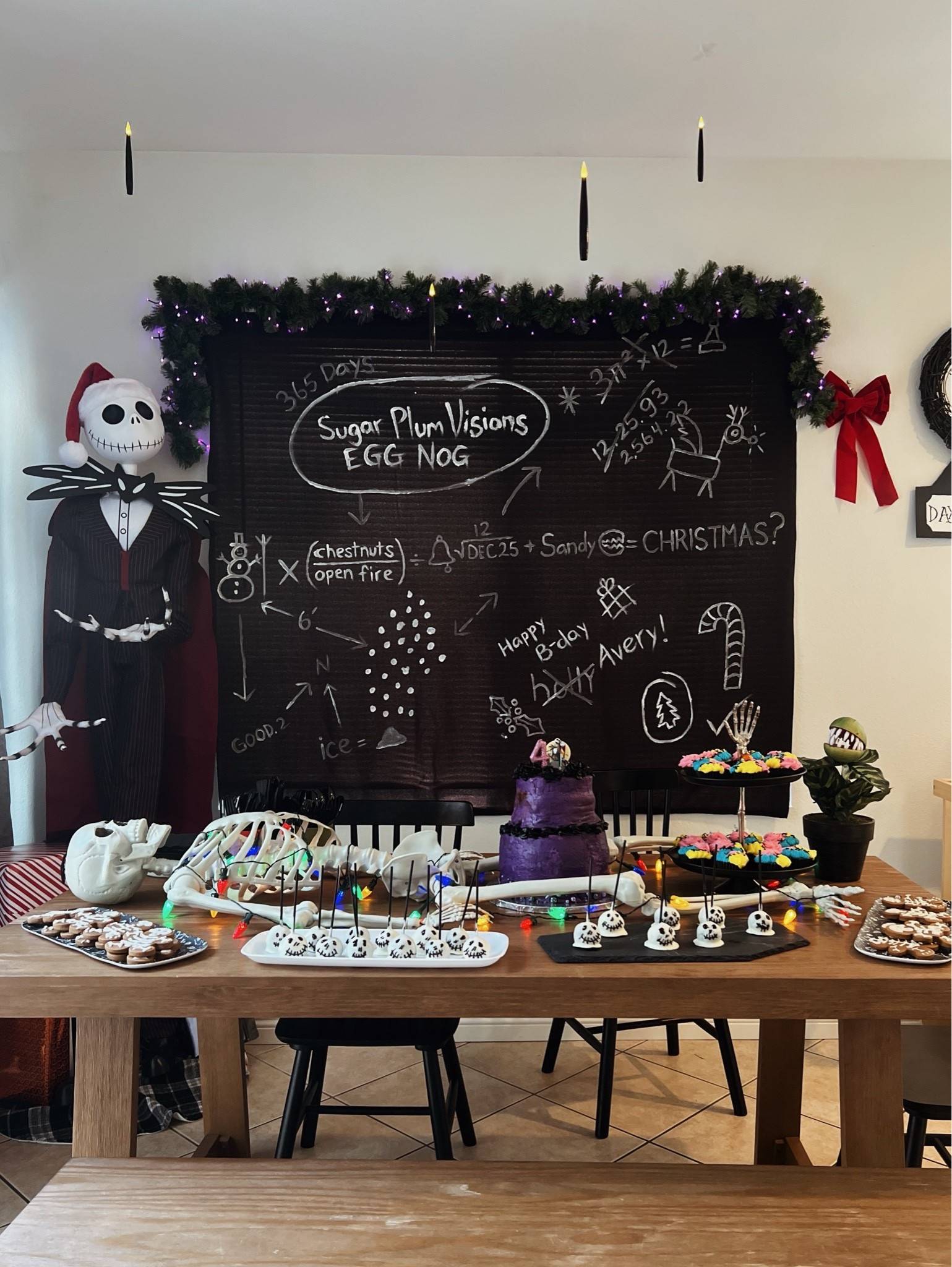 Nightmare B4 Christmas birthday party! A lot of DIY went into it? We actually painted the “chalkboard” from the movie in the background of this photo. Visit my blog www.onanothercoast.com for the entire post and rundown on how to copy the diy! #jackskellington #sally #nightmarebeforechristmas #halloween #halloweenparty

#LTKKids