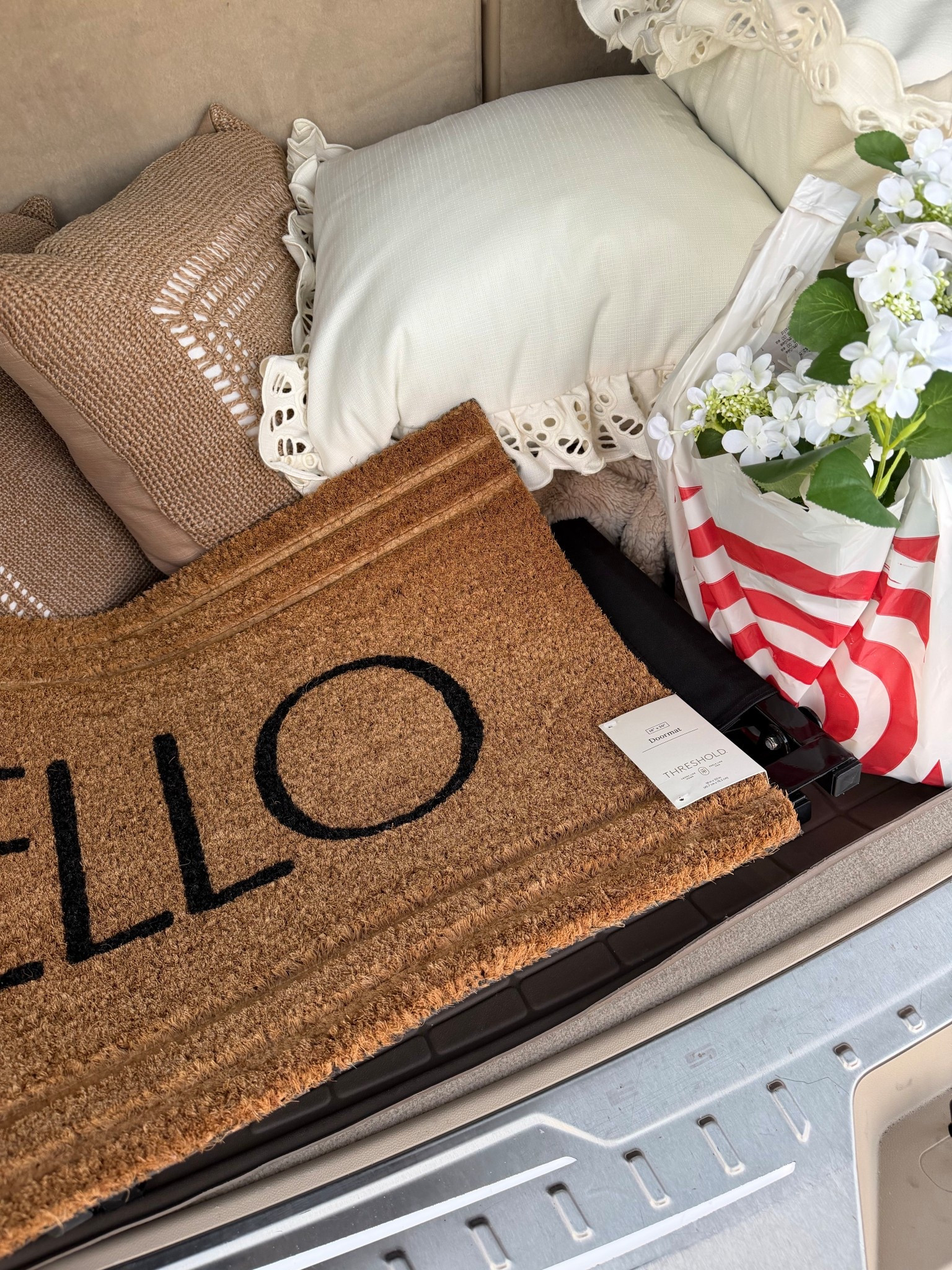 My random Friday night Target run. Came home with doormats and new pillows for the outdoor couch 

#LTKHome