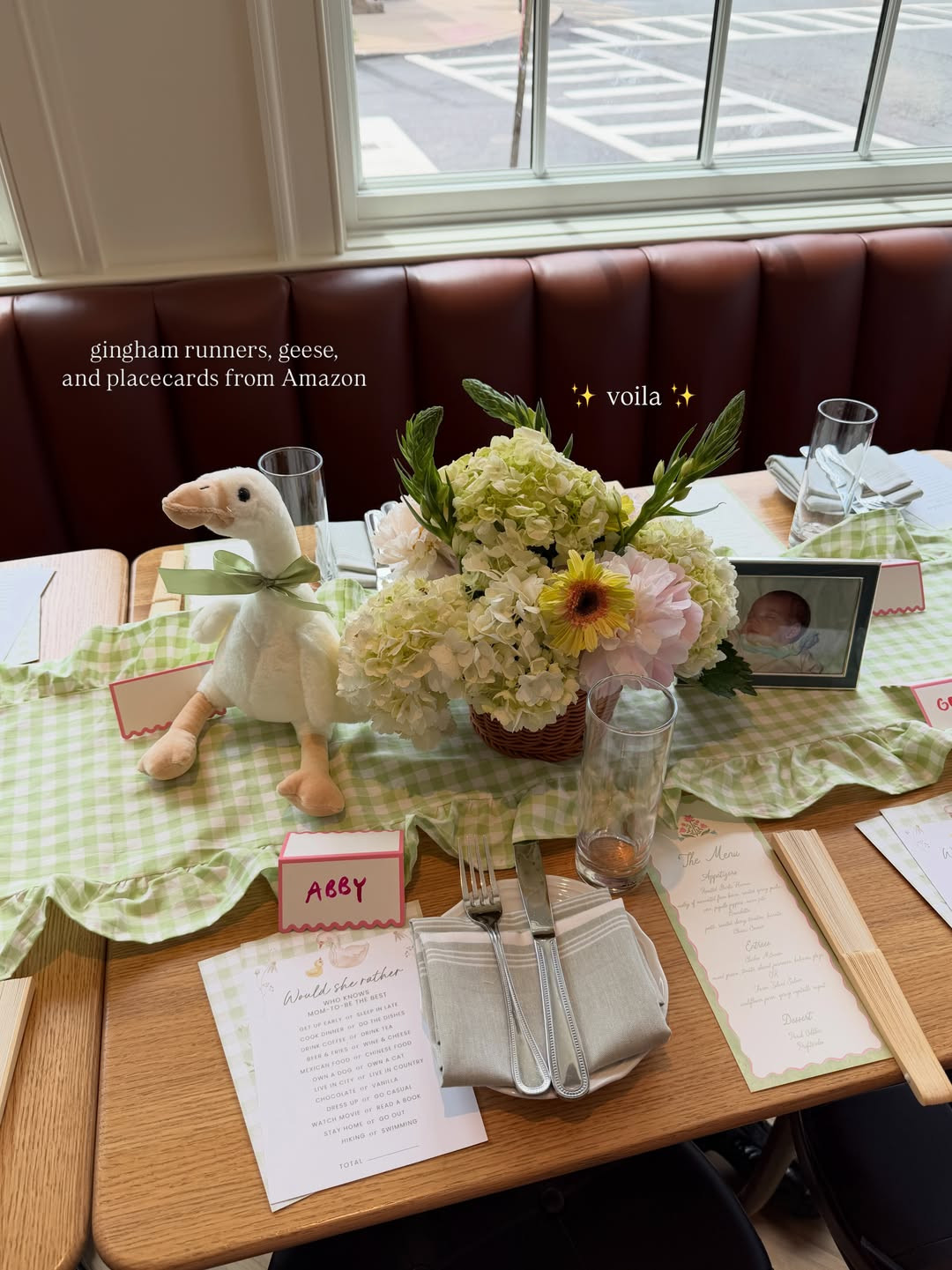 [6/23/26] This little centerpiece turned out even sweeter than I imagined — soft florals, green gingham, and the cutest goose detail to tie our whole baby shower theme together. 

 #LTKmomlife #LTKHome #LTKBaby