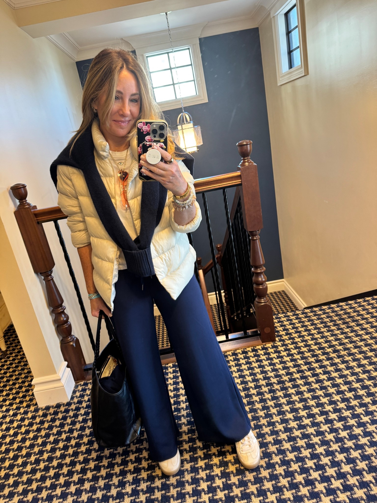 Day two of the cold spell. This little packable down jacket travels with me everywhere. It’s great over work out clothes, layered under a heavier cloth coat to give added warmth. Or just as a down cardigan of sorts. Here I paired it with my Spanx air essentials sweats, and it was perfect.

#LTKmomlife #LTKdayinmylife #LTKootd
