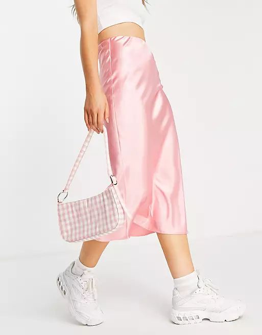 ASOS DESIGN satin bias slip midi skirt in rose pink | ASOS (Global)