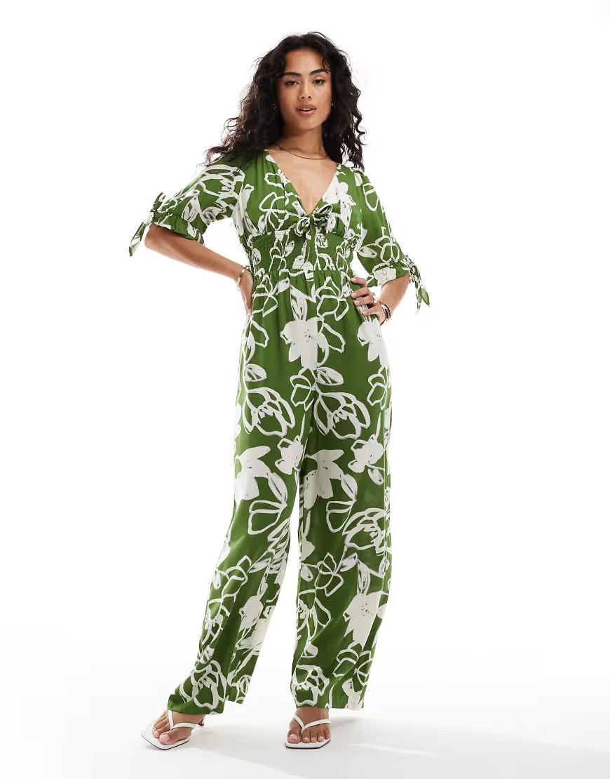ASOS DESIGN shirred waist jumpsuit action in green floral-Multi | ASOS (Global)