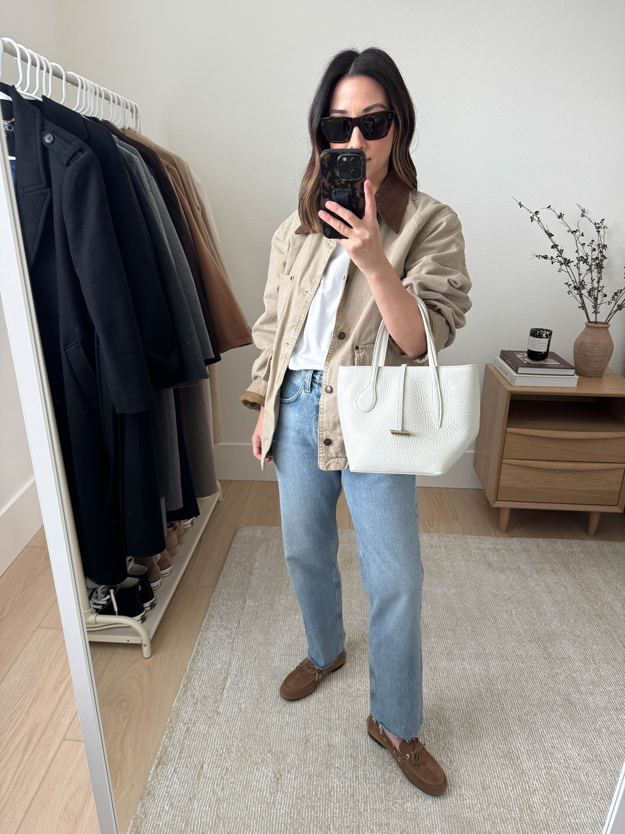 Really love this barn jacket. It’s padded, so warmer but also thicker. Color is a pretty beige. Xs fits well. 

Love these straight hat light was jeans. Cut hems. 

Mango jacket xs
J.crew tee small
AGOLDE Valen jeans 25. Cut hems. 
Everlane loafers 5.5
Liffner mini sprout 
Celine sunglasses 

#LTKShoeCrush #LTKItBag #LTKPetite