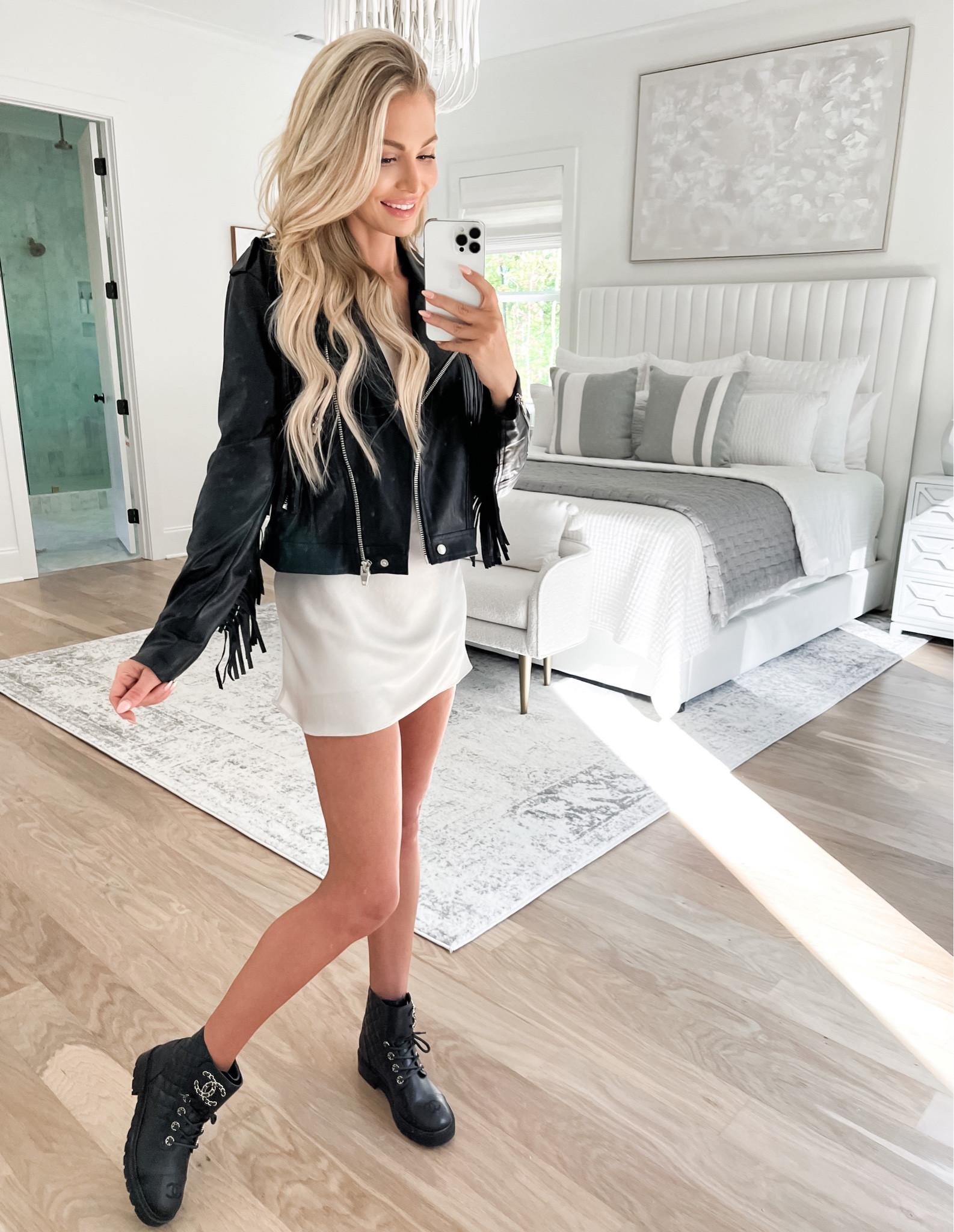 Fall fashion black leather jacket faux vegan leather fringe nashville western country BuddyLove 