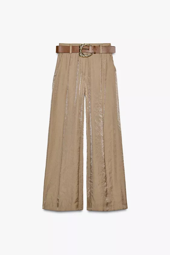 Flowy high-waisted pants with front pleats and a belt. Front pockets. Wide leg. Front zip, inside... | Zara US