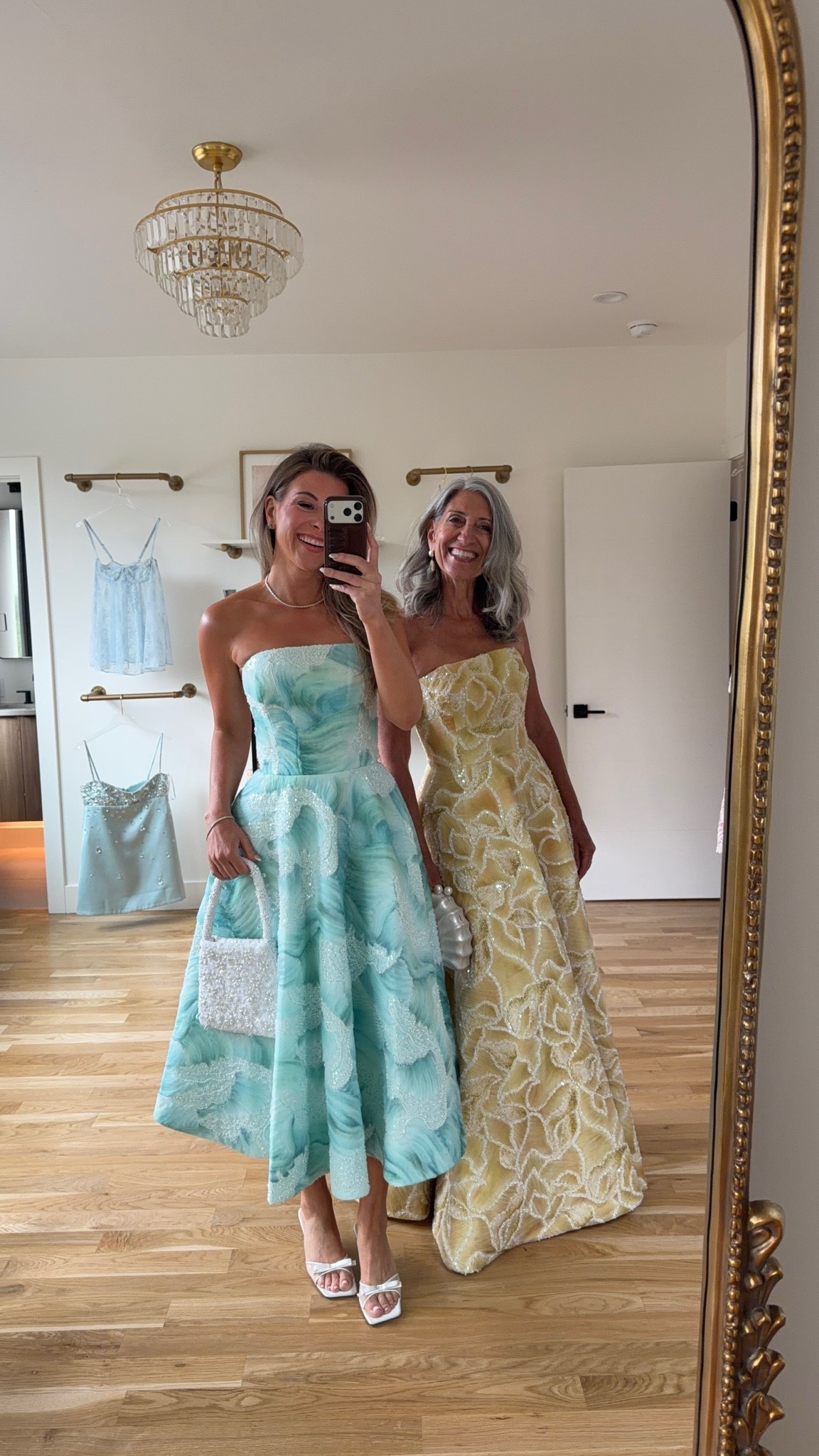 🌼 the strapless pairing that catches every light in the room.

An aqua beaded print strapless midi with a structured bodice and a full skirt that holds and moves beautifully. 

A golden yellow sequin floral strapless gown with a full skirt that flows with effortless warm joy all evening long.

I wear a medium or 6. Emerson wears her usual small or 2.

Save this for your next invitation.

Share it with a friend who's shopping. 💌

#weddingguestdress #motherofthebride #springwedding #weddingseason2026 #occasiondress wedding guest dress summer

#LTKSeasonal #LTKOver40 #LTKWedding