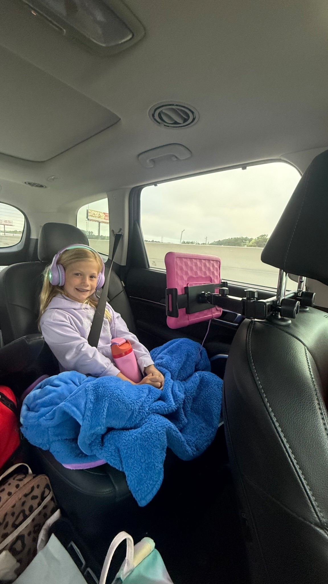 This car screen holder is amazing!!! Holds anything from a phone to a tablet!! Great for keeping their heads up and not getting stiff necks!! 

#LTKTravel #LTKmomlife #LTKKids