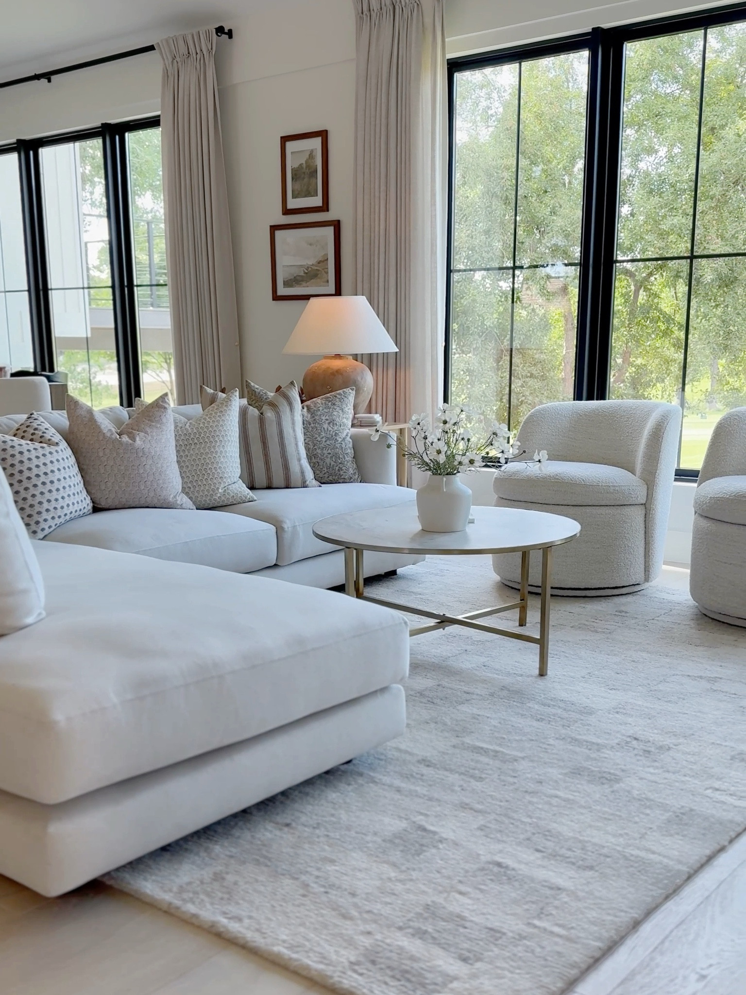 Starting to get the living room ready for spring, and I’m loving how fresh and cozy it feels! The soft neutrals, layered pillows, and those boucle chairs are perfect for brightening things up as we head into a new season. If you’re thinking about a little refresh, you can find similar pieces through my LTK!

#LTKFindsUnder100 #LTKStyleTip #LTKHome