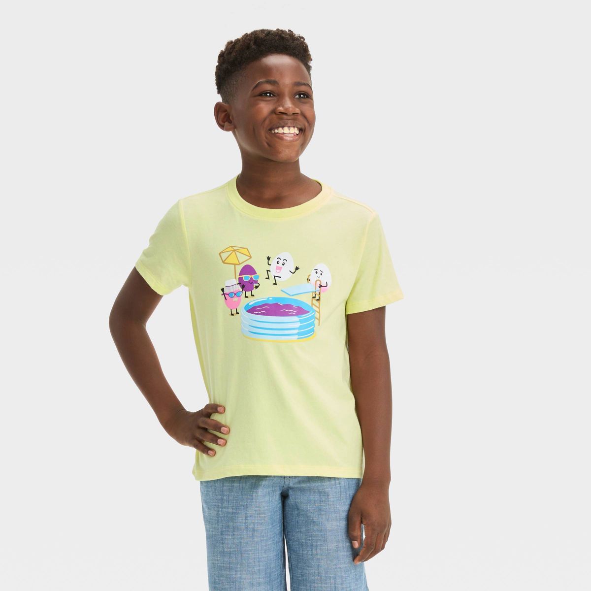 Boys' Short Sleeve Sun Streak Dunking Easter Eggs Graphic T-Shirt - Cat & Jack™ Light Yellow | Target
