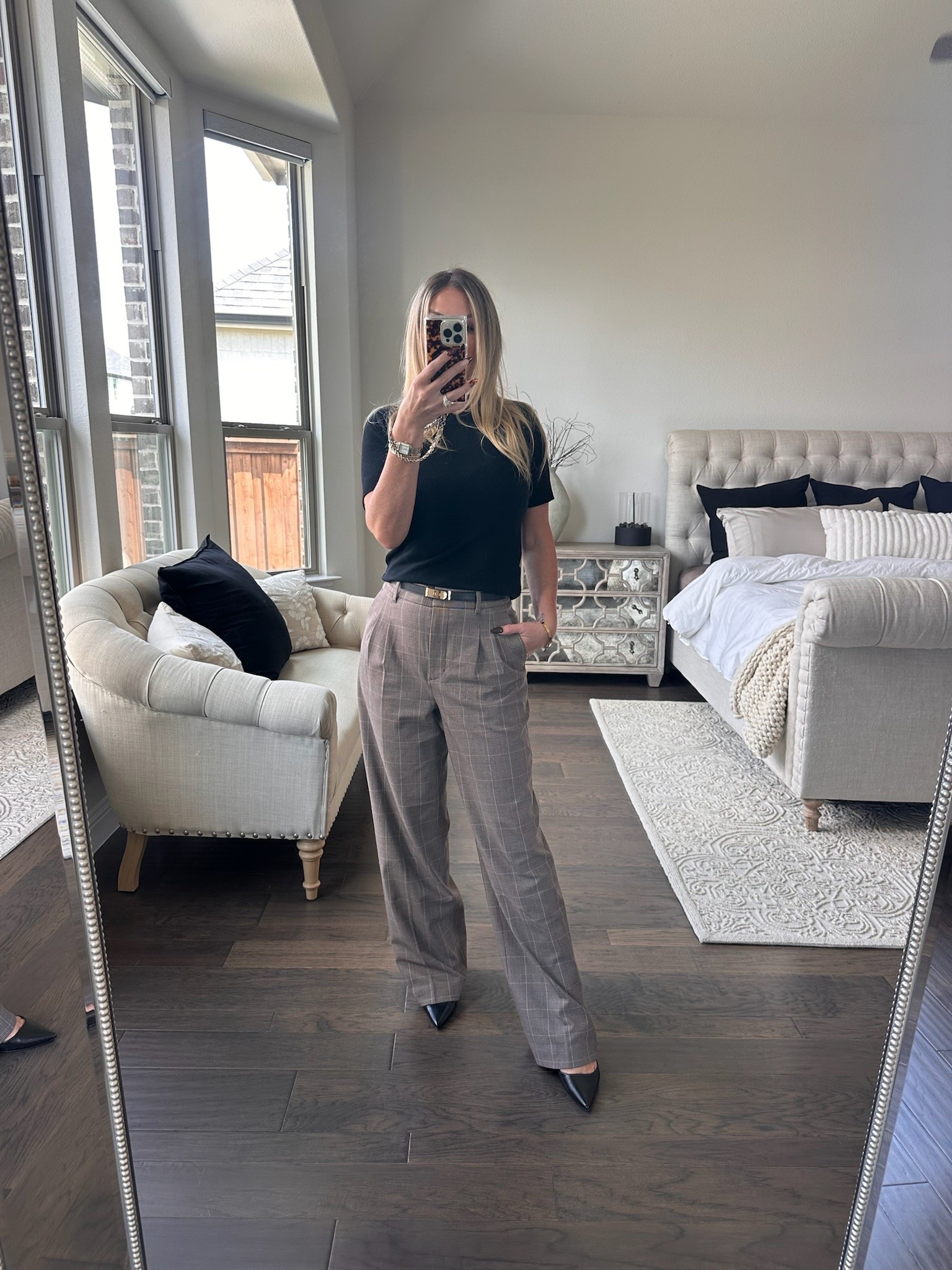 Polished fall dressing, but still easy enough for real life. 🤎 A simple black tee with plaid trousers, pointed-toe heels + a slim belt is one of those outfit formulas that always feels pulled together without trying too hard.

Perfect for work, dinner, meetings or anytime you want an elevated everyday look.

Shop my plaid trousers, black tee, heels + accessories here.

#LTKStyle #LTKWorkwear #Over40Style #FallOutfits #PlaidPants #ElevatedBasics