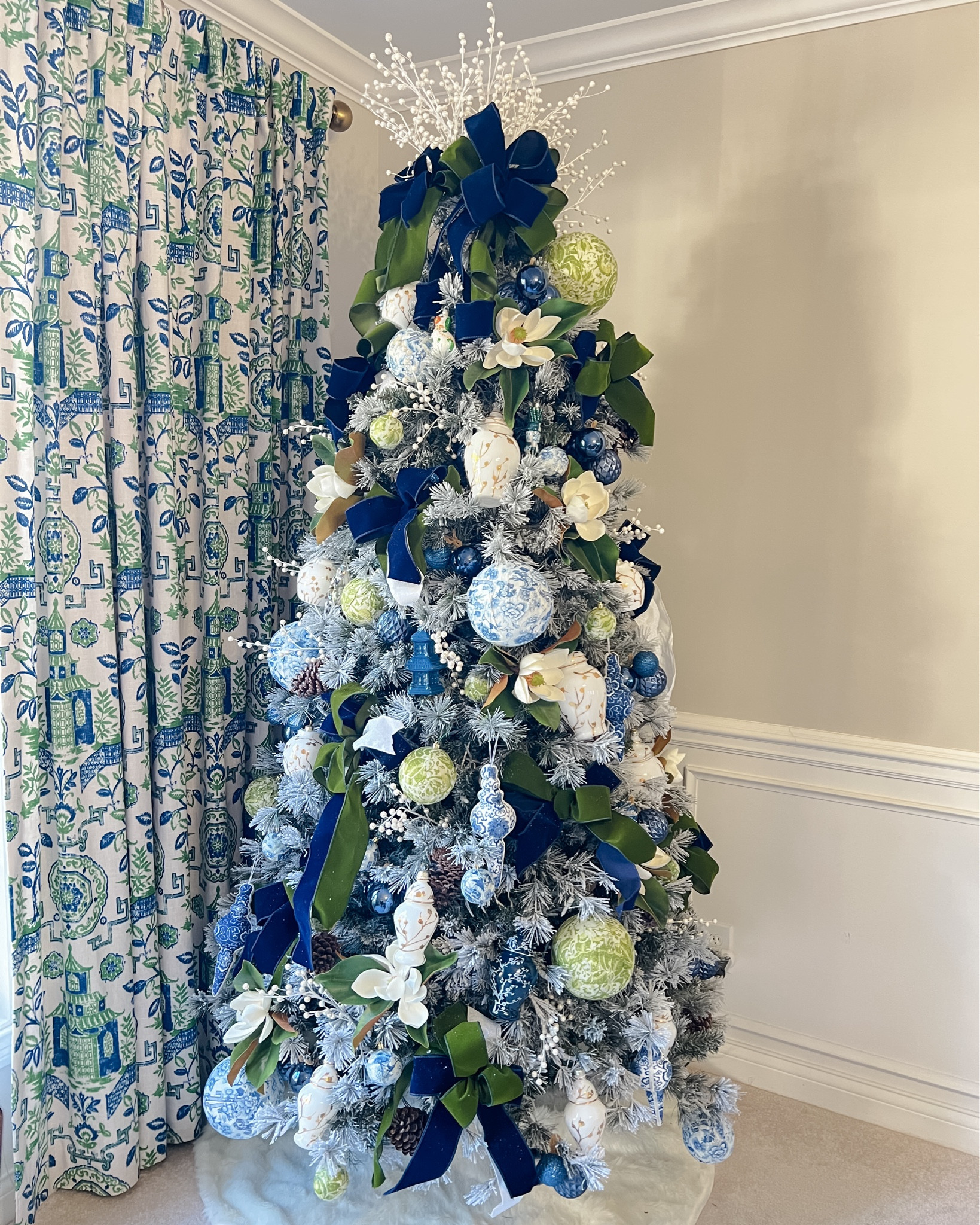 Grandmillennial Christmas tree. Love the blues and greens and ginger jars. The blue and green printed balls are napkins decoupaged onto shatterproof ornaments  

#LTKhome #LTKHoliday #LTKSeasonal