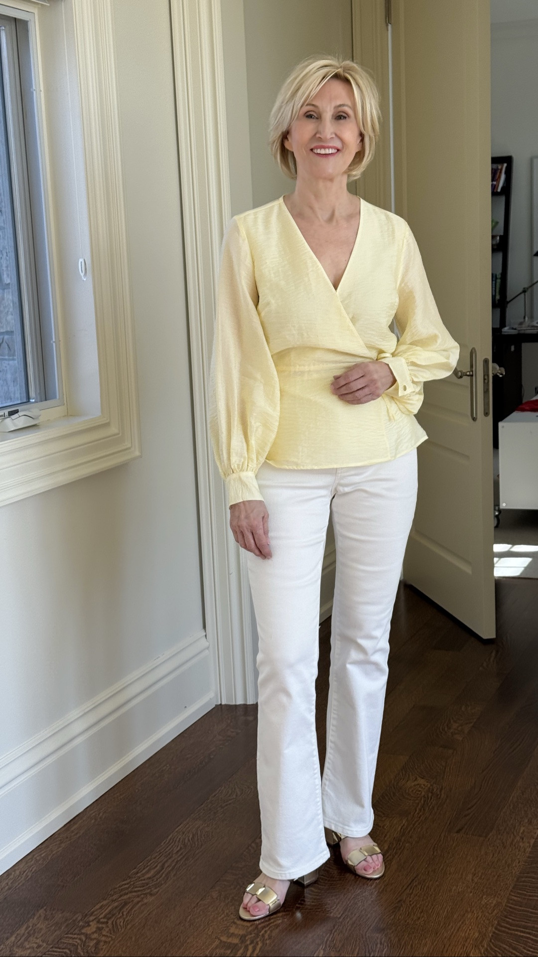 You know those days when you want to look polished and pulled together, but you don’t want to spend ages figuring out what to wear? This yellow wrap top from Macy’s is exactly the kind of piece I reach for. Paired with crisp white jeans and gold block heels, it feels fresh, flattering, and effortlessly chic.

One thing I hear from so many women over 50 is that they start feeling invisible in their clothes, sticking to dark neutrals because bright colors can seem intimidating. But here’s my take: a beautiful, sunny shade like yellow can instantly brighten your complexion and your mood without looking over the top.

The wrap silhouette is especially forgiving and feminine, creating shape in all the right places while keeping you comfortable. Debs style takeaway? If you’re looking to refresh your wardrobe, start with one confidence-boosting color and pair it with timeless basics. Sometimes that’s all it takes to make an outfit feel modern, elegant, and completely you.

#LTKOver40 #LTKSeasonal #LTKootd