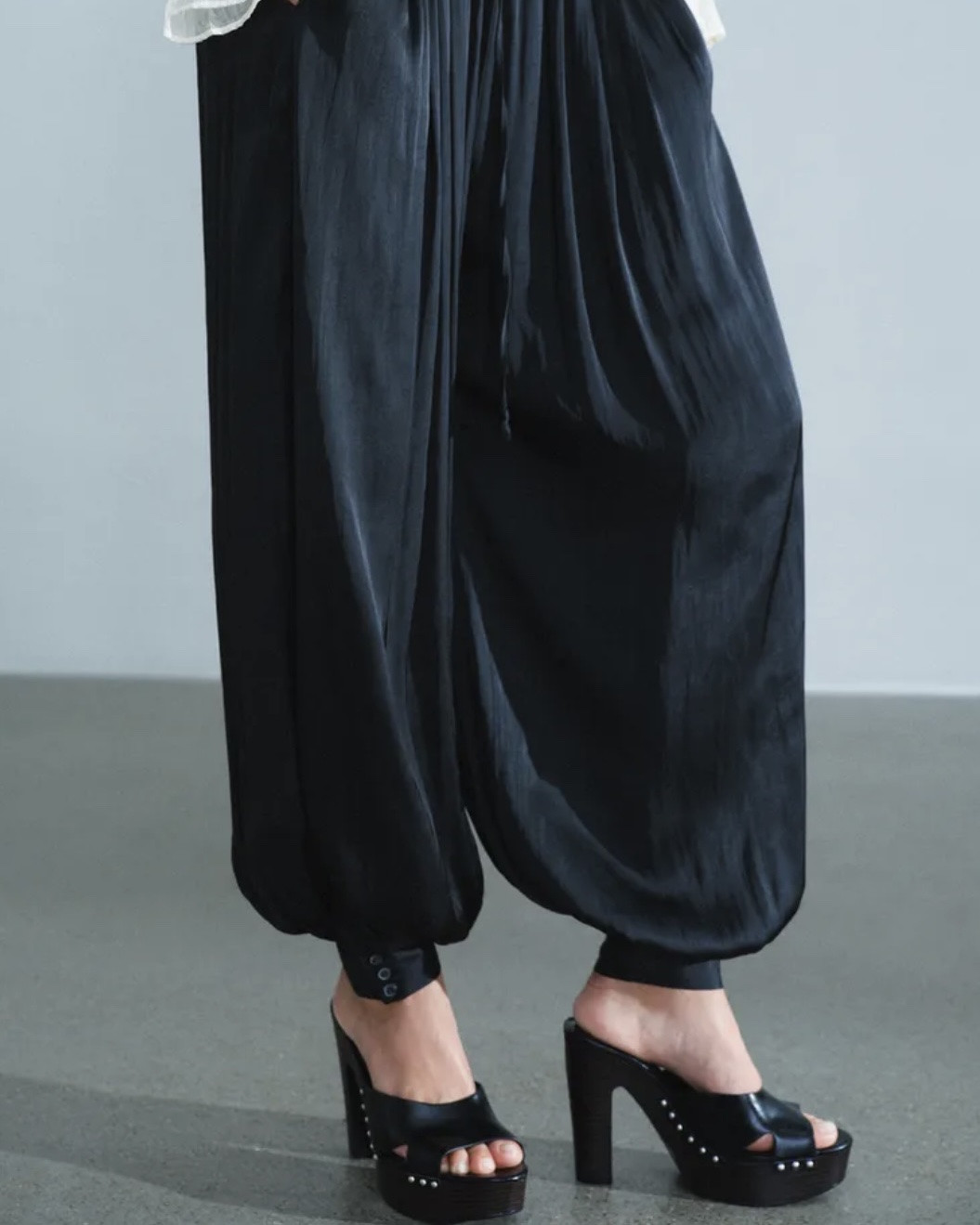 @Zara satin balloon pants with a relaxed, draped fit and button-cuff ankle. Such a chic alternative to basic black trousers and an easy way to make a simple fall outfit feel more elevated.

#LTKootd #LTKOver40 #LTKWorkwear