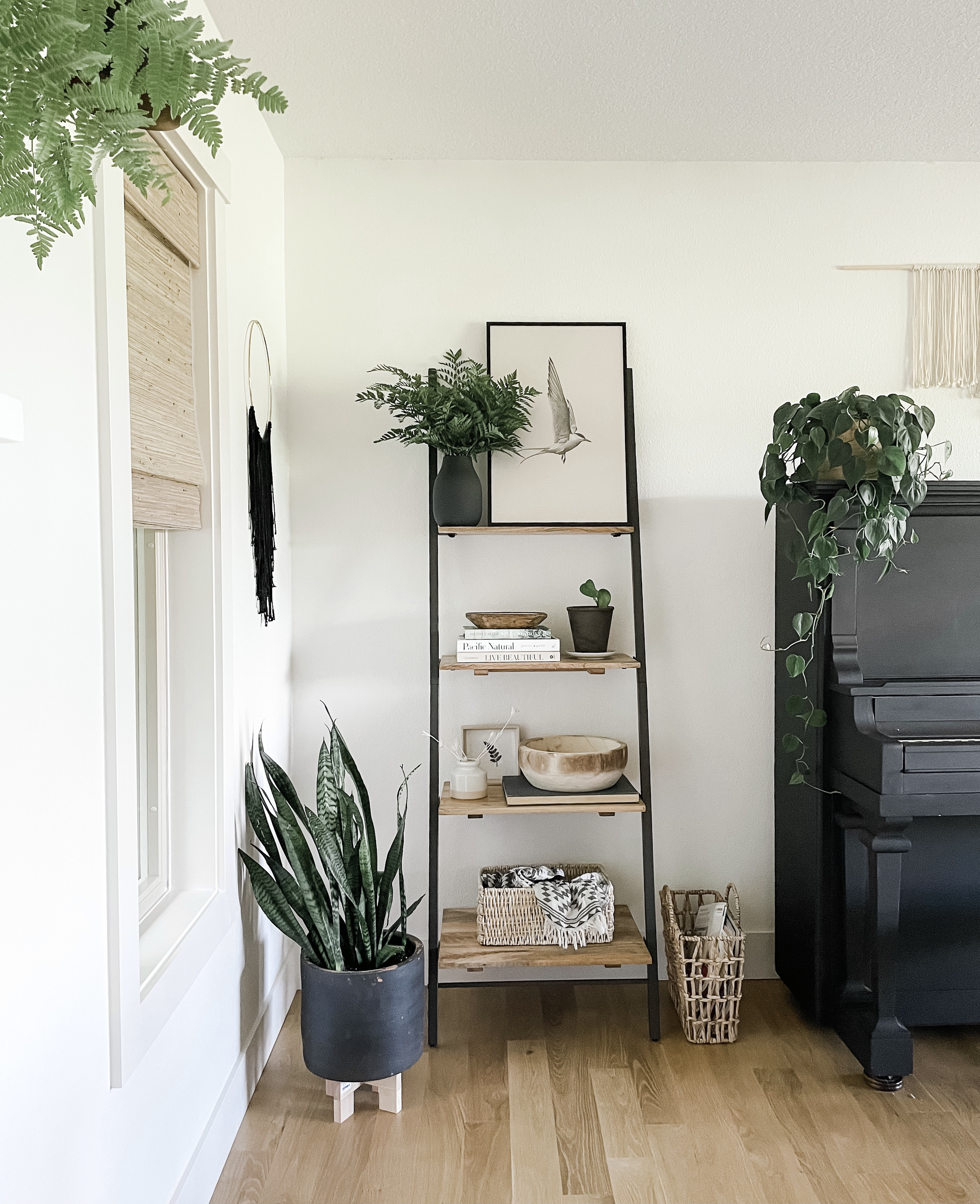 The key to shelf styling is a mix of contrast, texture and shape. Here we’ve got neutral & black decor with wood bowls, woven baskets and embroidered art. Vertical artwork and green stems give it height. Grab these pieces for easy, mixed, and match styling! 

#LTKHome
