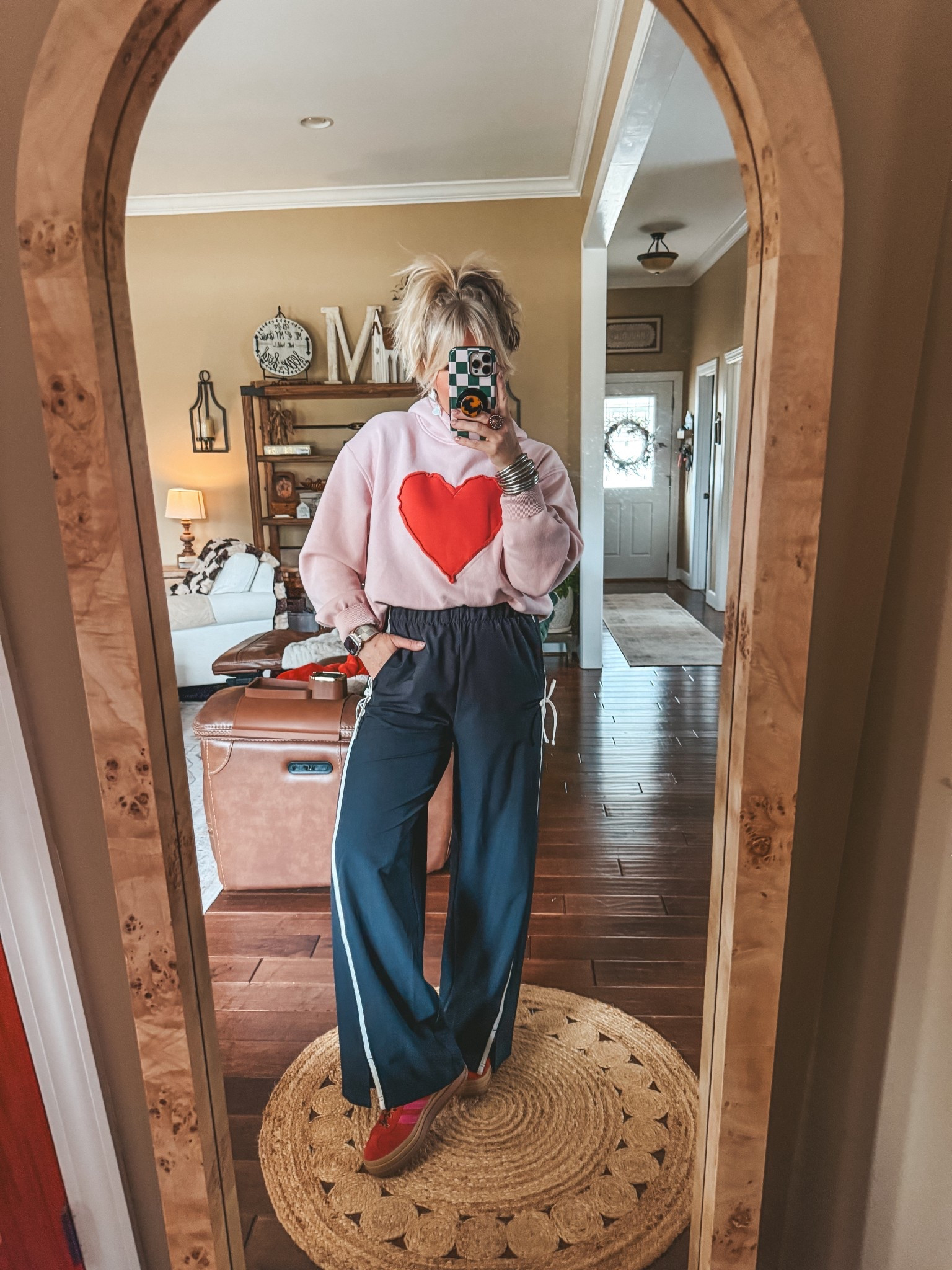 This is the cutest hoodie and pants! I’m wearing a medium in both and I’m a size 8/M  

#LTKOver40 #LTKFindsUnder50 #LTKootd