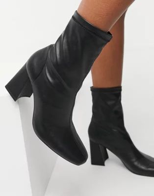 Bershka patent boot with flared heel in black | ASOS (Global)