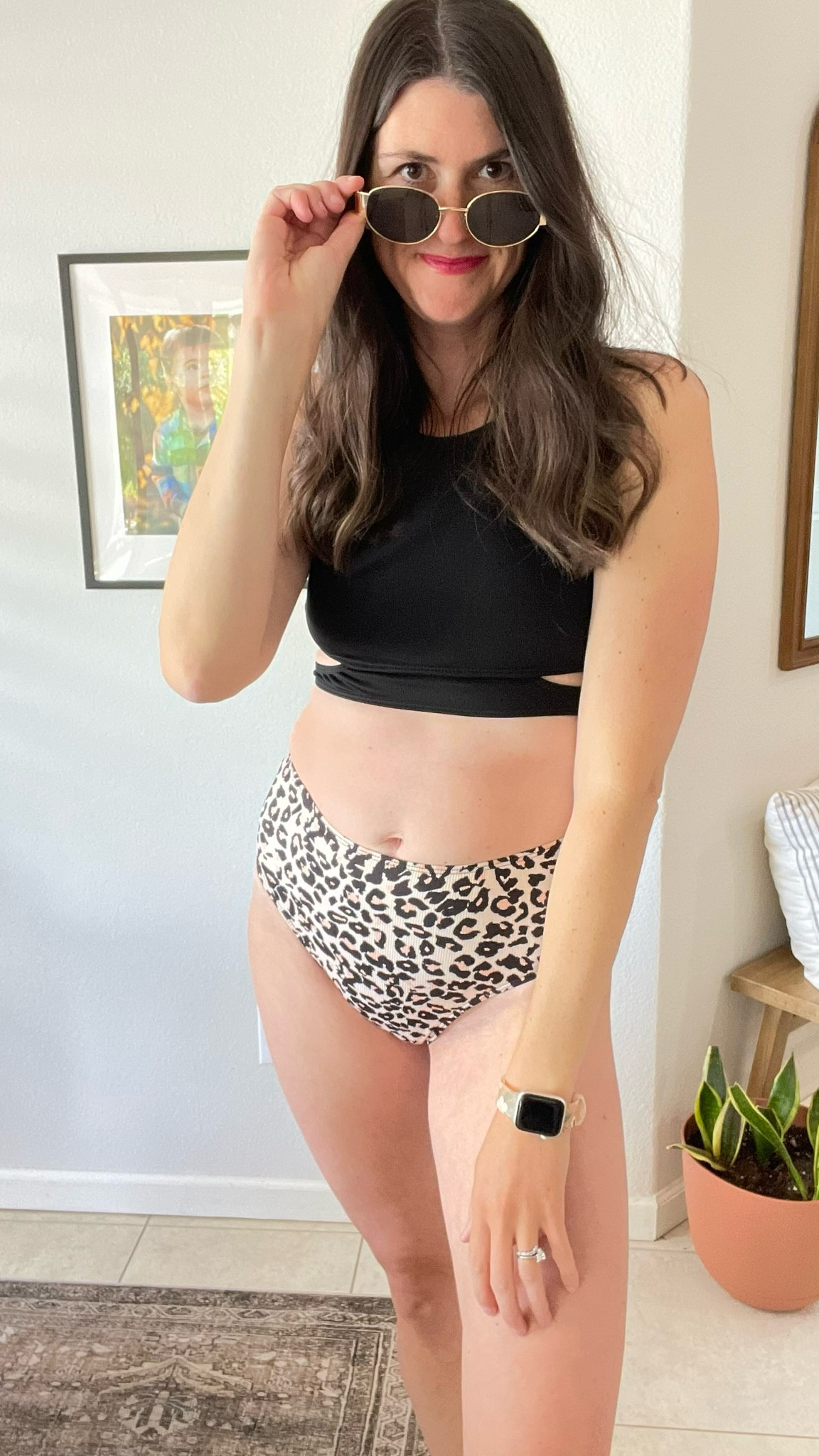 Trying to wear more two pieces that are modest and flattering. This one is great. I love the peekaboo along the sides where it ties in the back. The bottoms are high waist with a cheeky bottom. I am wearing a size medium. Im 5’11” and 150bs. The leopard print is so flattering. 

#LTKSwim #LTKSeasonal #LTKOver40