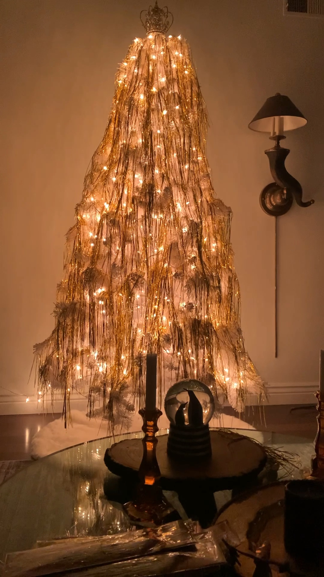 Gold tinsel curtain to wrap around your Christmas tree 

#LTKHoliday #LTKSeasonal #LTKhome