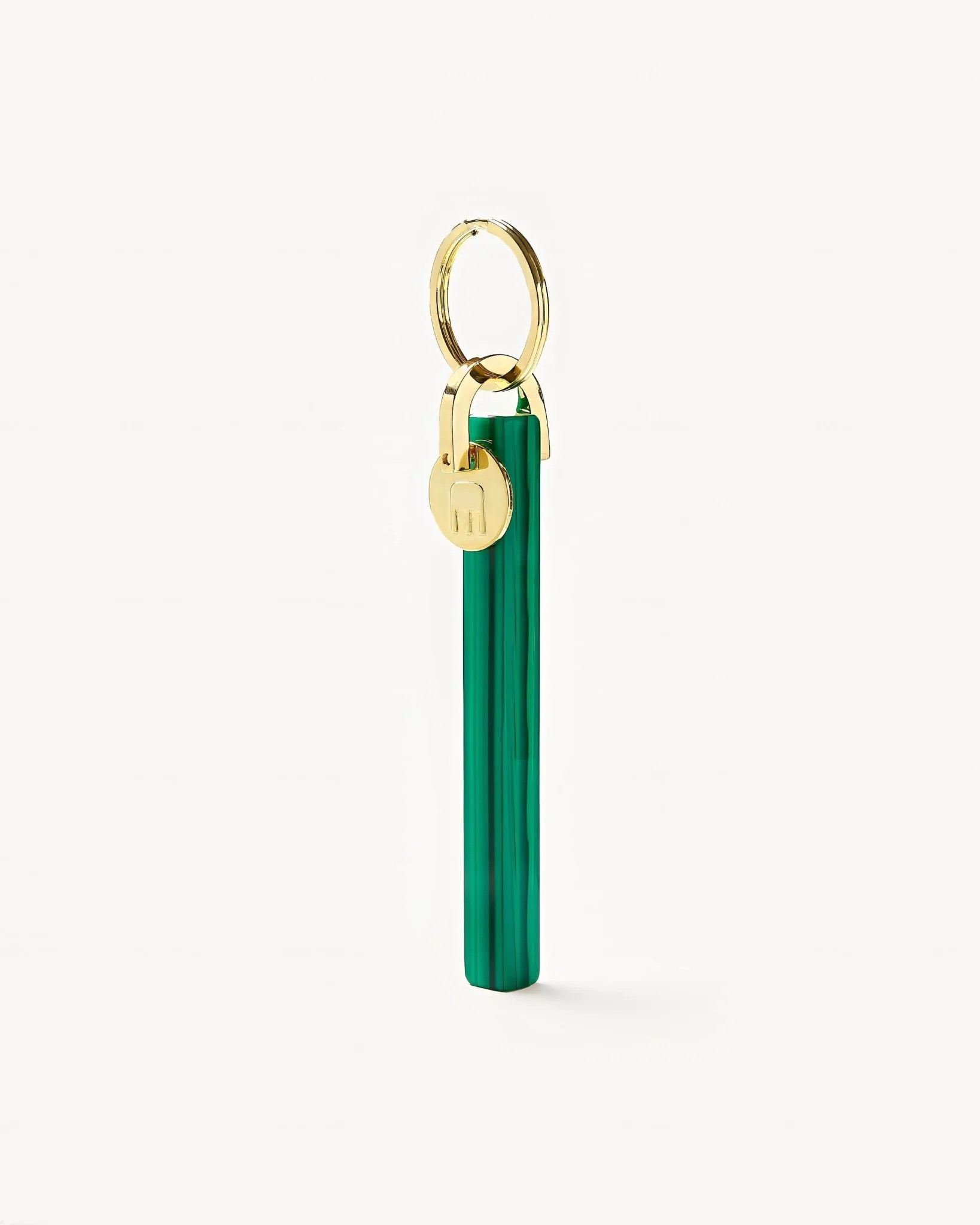 Machete keychain with malachite acetate bar. | Machete