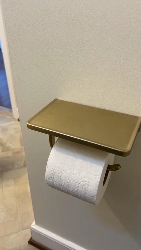 Brass toilet paper holder with shelf

#LTKVideo #LTKhome