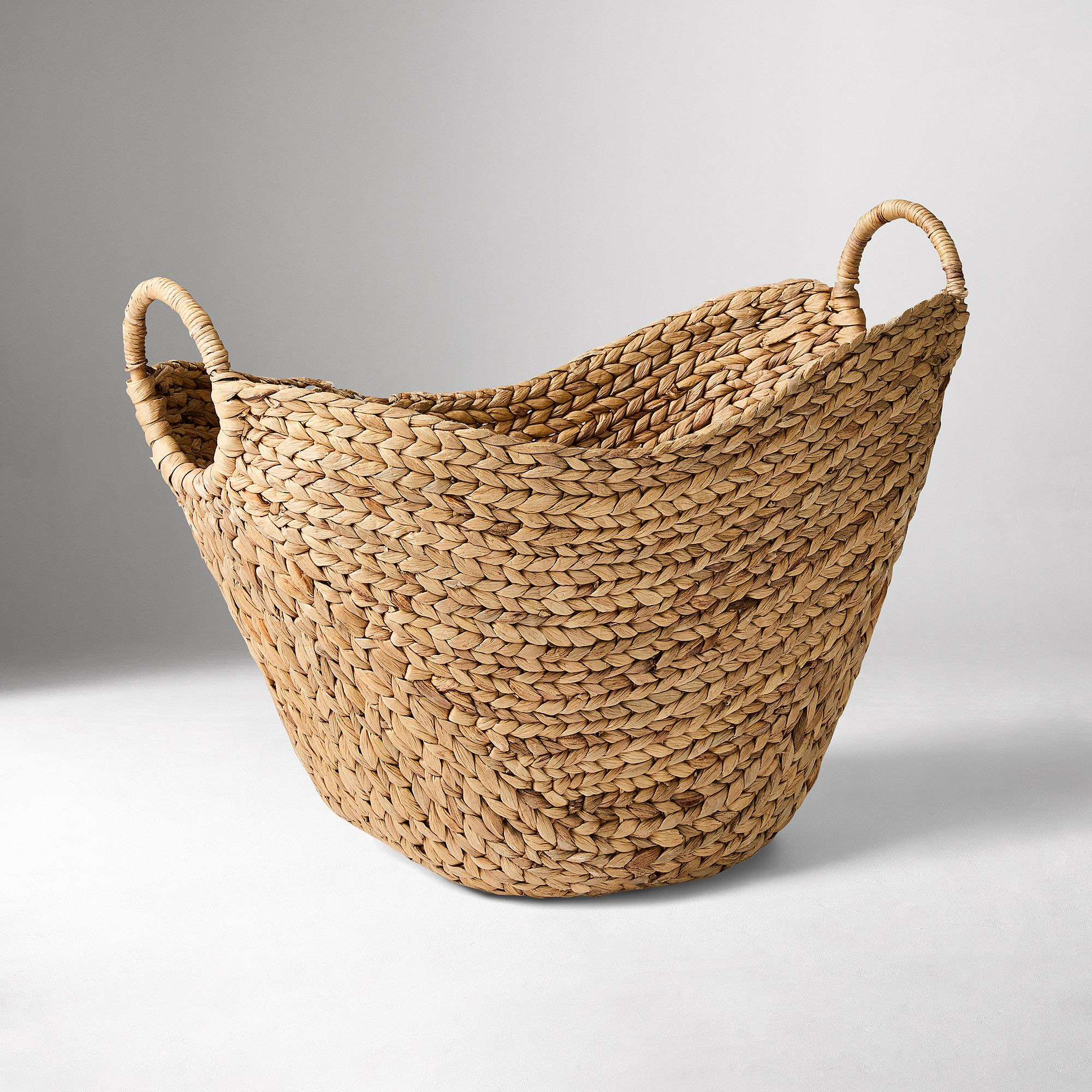 Curved Seagrass Baskets | West Elm (US)