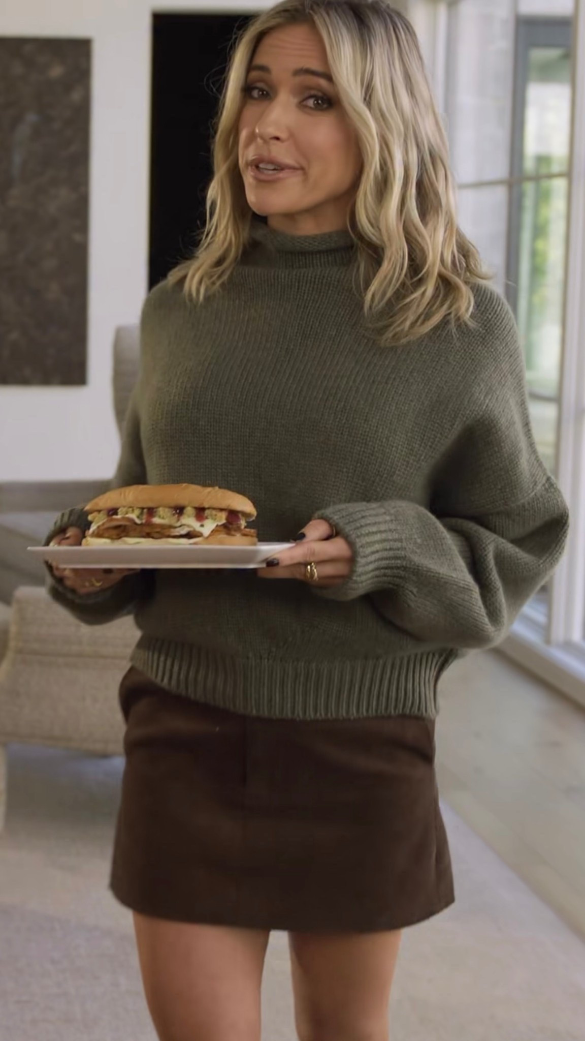 Kristin Cavallari's Thanksgiving holiday ready pine green sweater crafted of luxe cashmere, is designed with a funnel neck, drop shoulders, and long puff sleeves.

#LTKSeasonal #LTKStyleTip #LTKHoliday