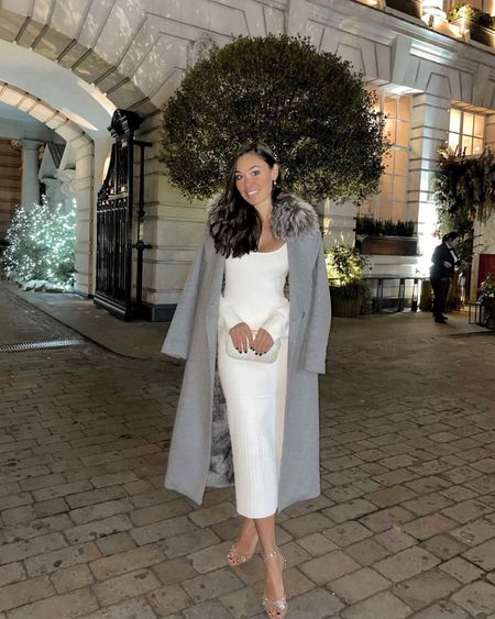 Kat Jamieson of With Love From Kat wears a winter evening outfit. Fur coat, knit midi dress, sparkly heels, date night.

#LTKSeasonal #LTKstyletip