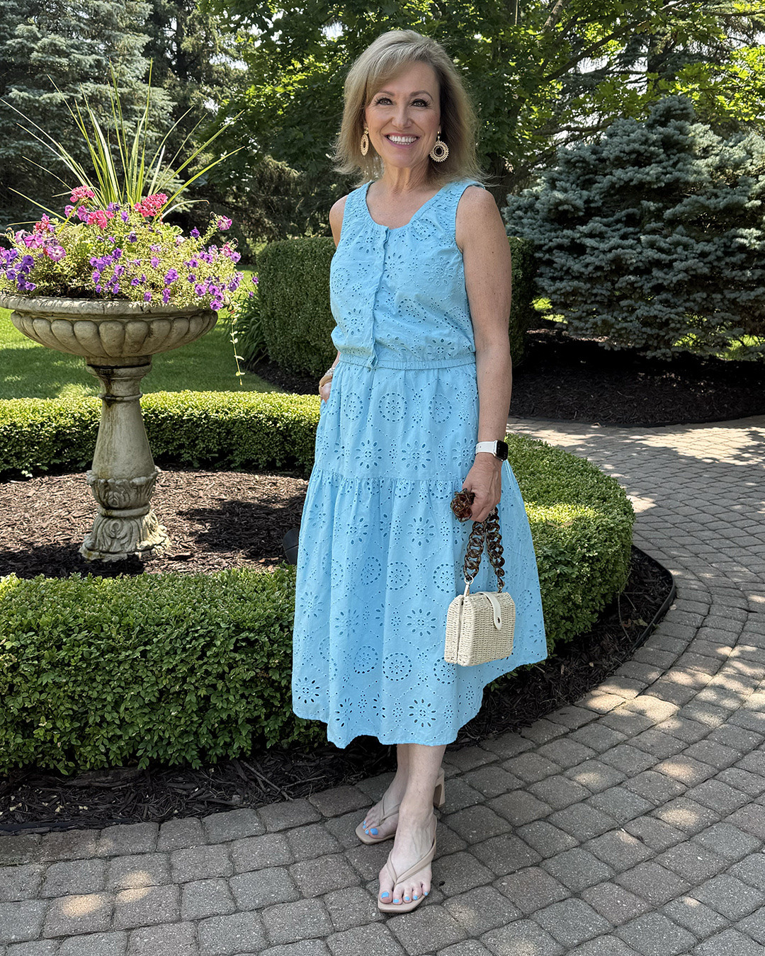 Target for the win!

If you are looking  for a quick add to your summer wardrobe, this is it. This is a two-piece set that you can purchase each piece separately (perfect if you are two different sizes) and you can wear each piece separately too! 

It’s a great color with wonderful eyelet details. Because of the color and the details, I kept my accessories neutral so the outfit is the star!